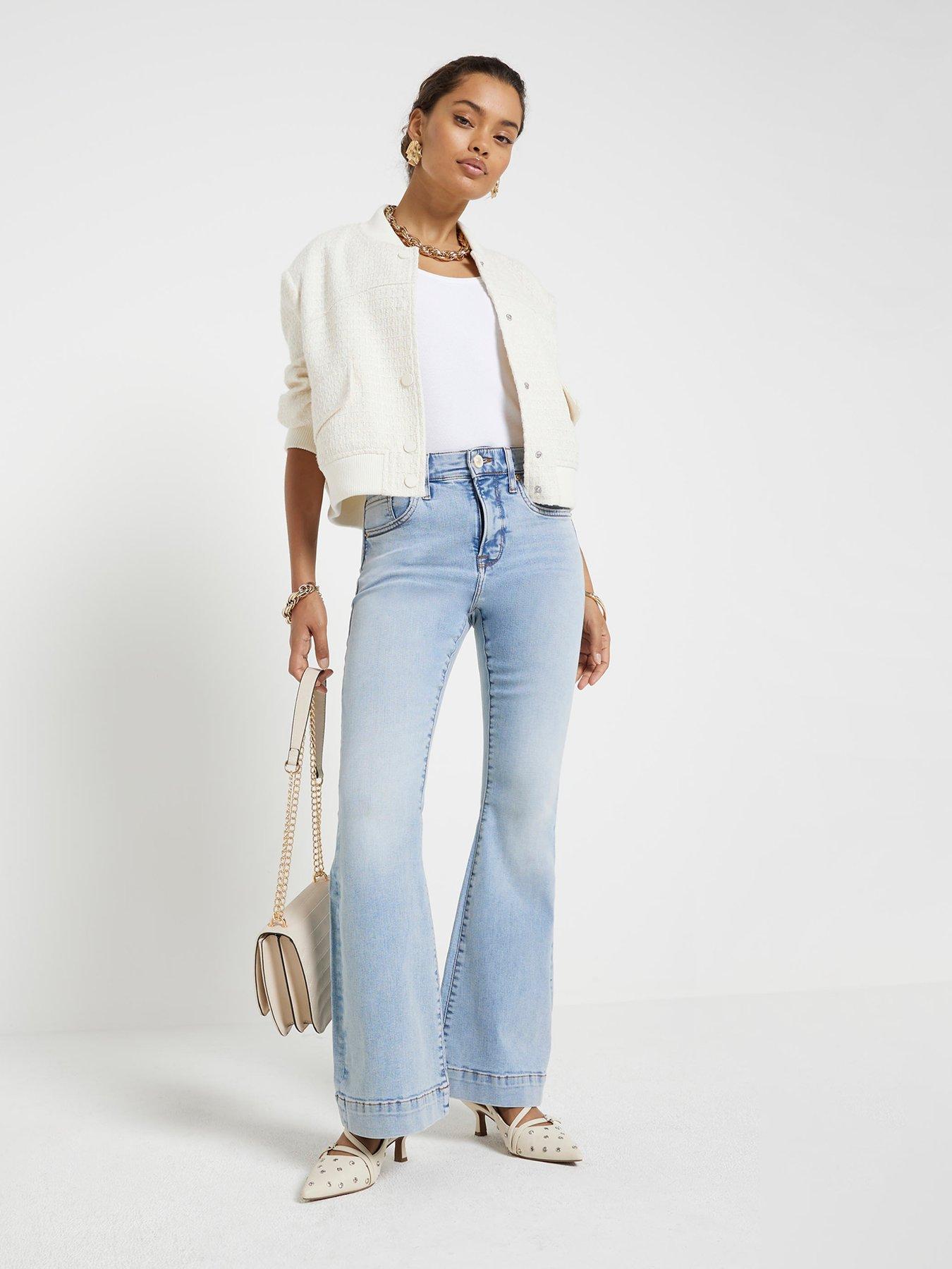 Image 3 of 5 of River Island Petite High Waisted Flared Jeans - Light Blue