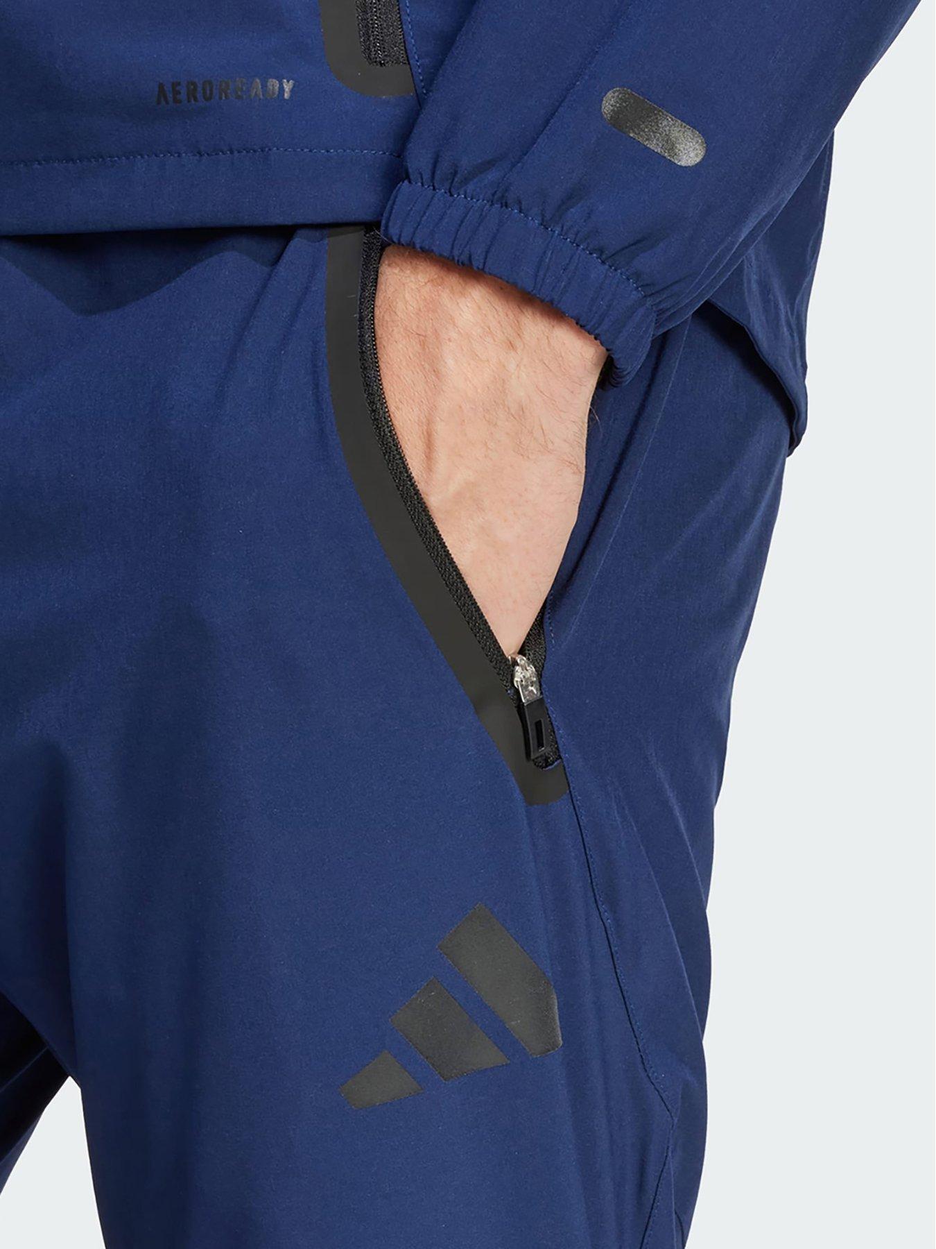 Image 4 of 5 of adidas Manchester United Tiro 25 Competition Vis Tech Travel Pants - Blue