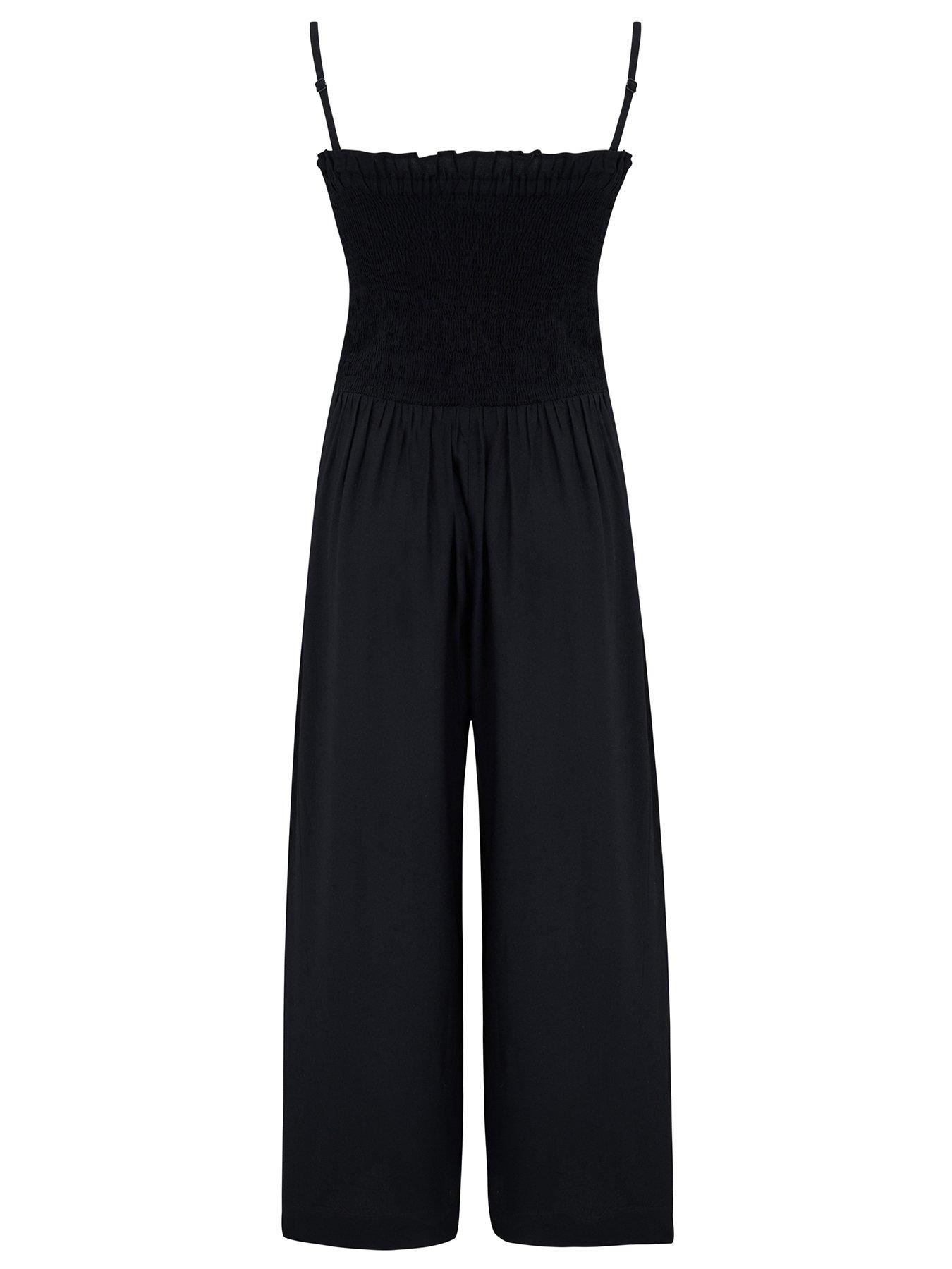 Image 4 of 4 of Pour Moi Strapless Shirred Bodice Crop Leg Beach Jumpsuit - Black