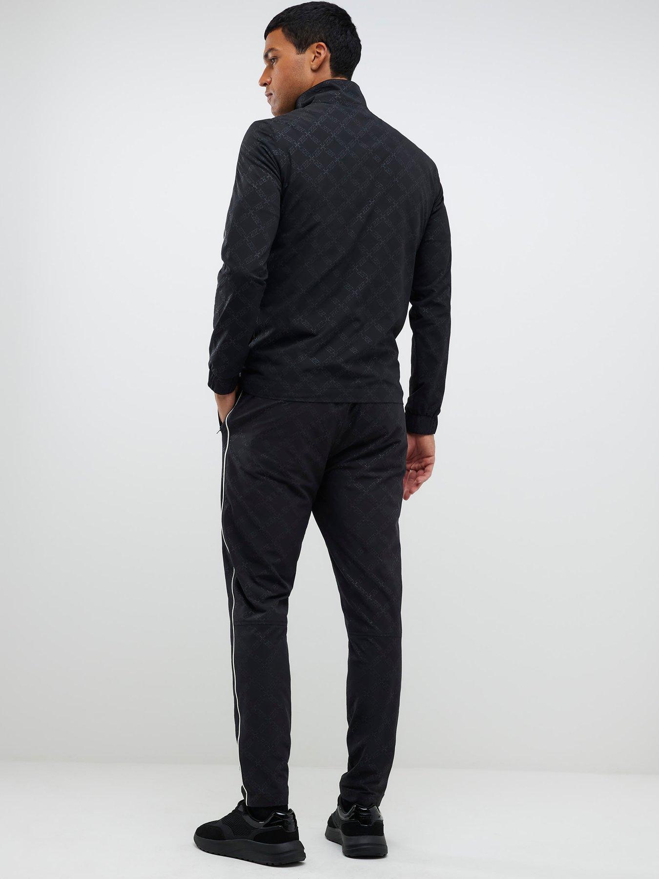 Image 2 of 4 of River Island Monogram Piped Joggers - Black