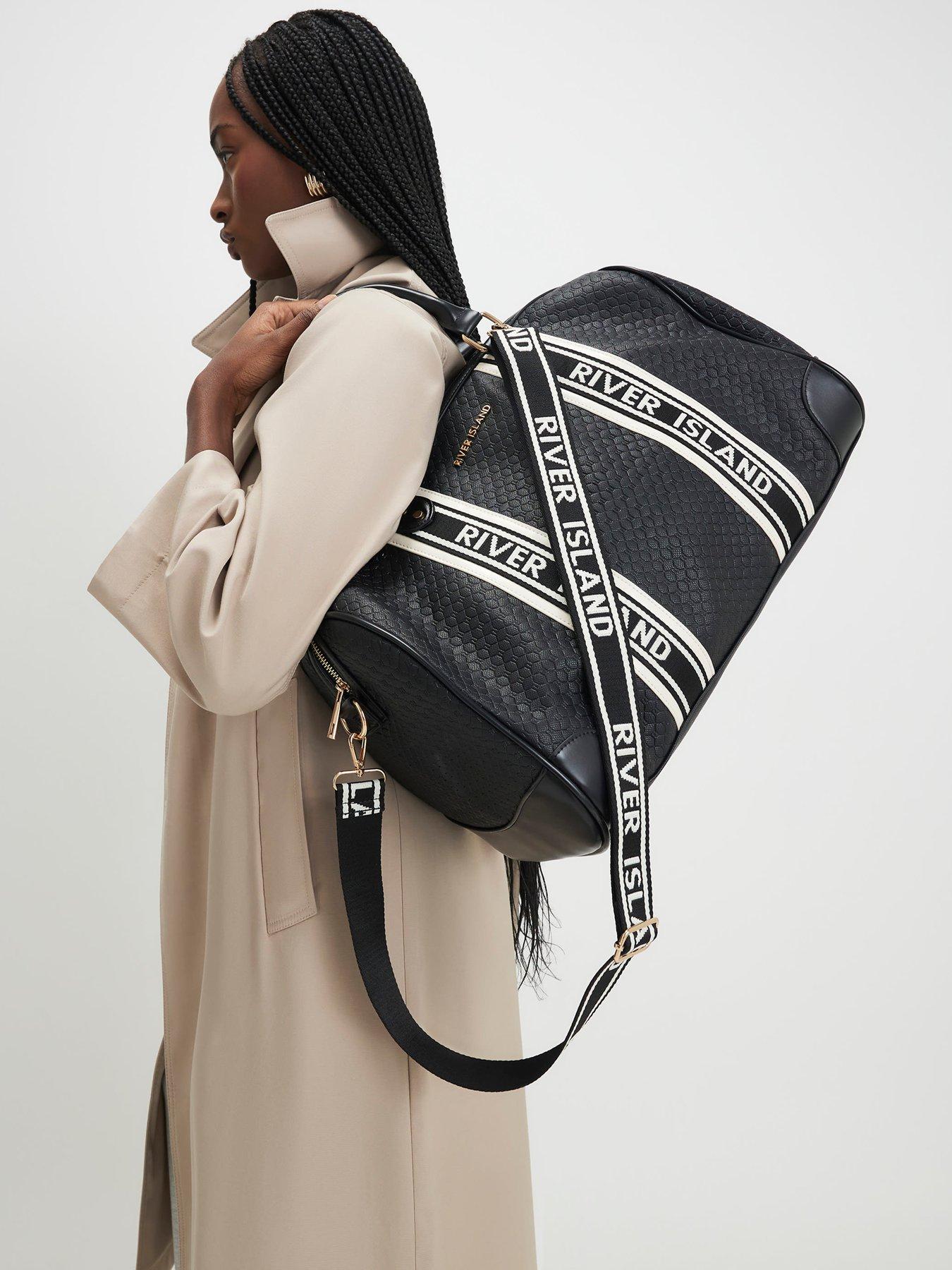 Image 2 of 4 of River Island Webbing Front Monogram Barrell Bag