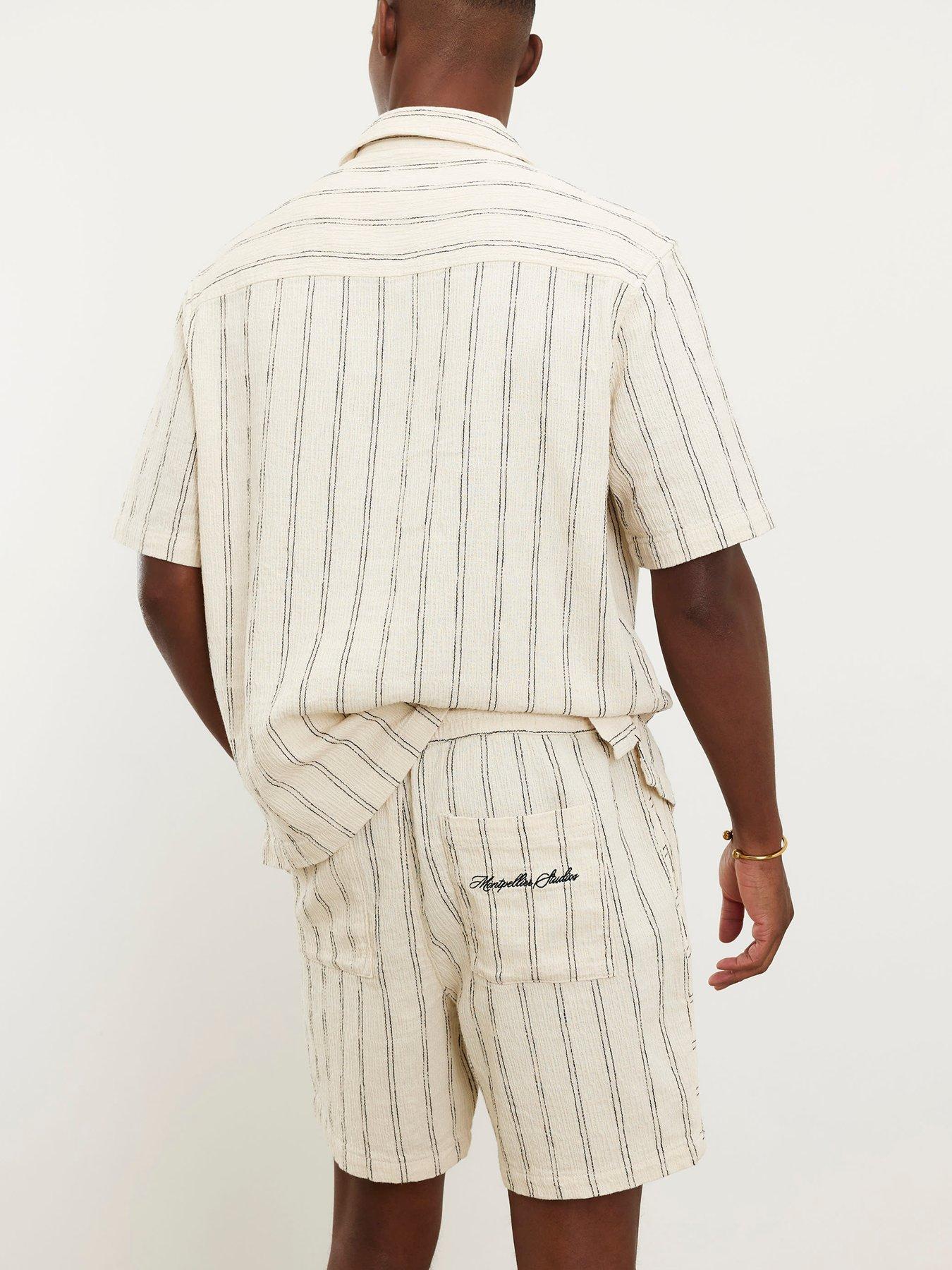 Image 2 of 4 of River Island Cream Regular Fit Stripe Pull On Shorts