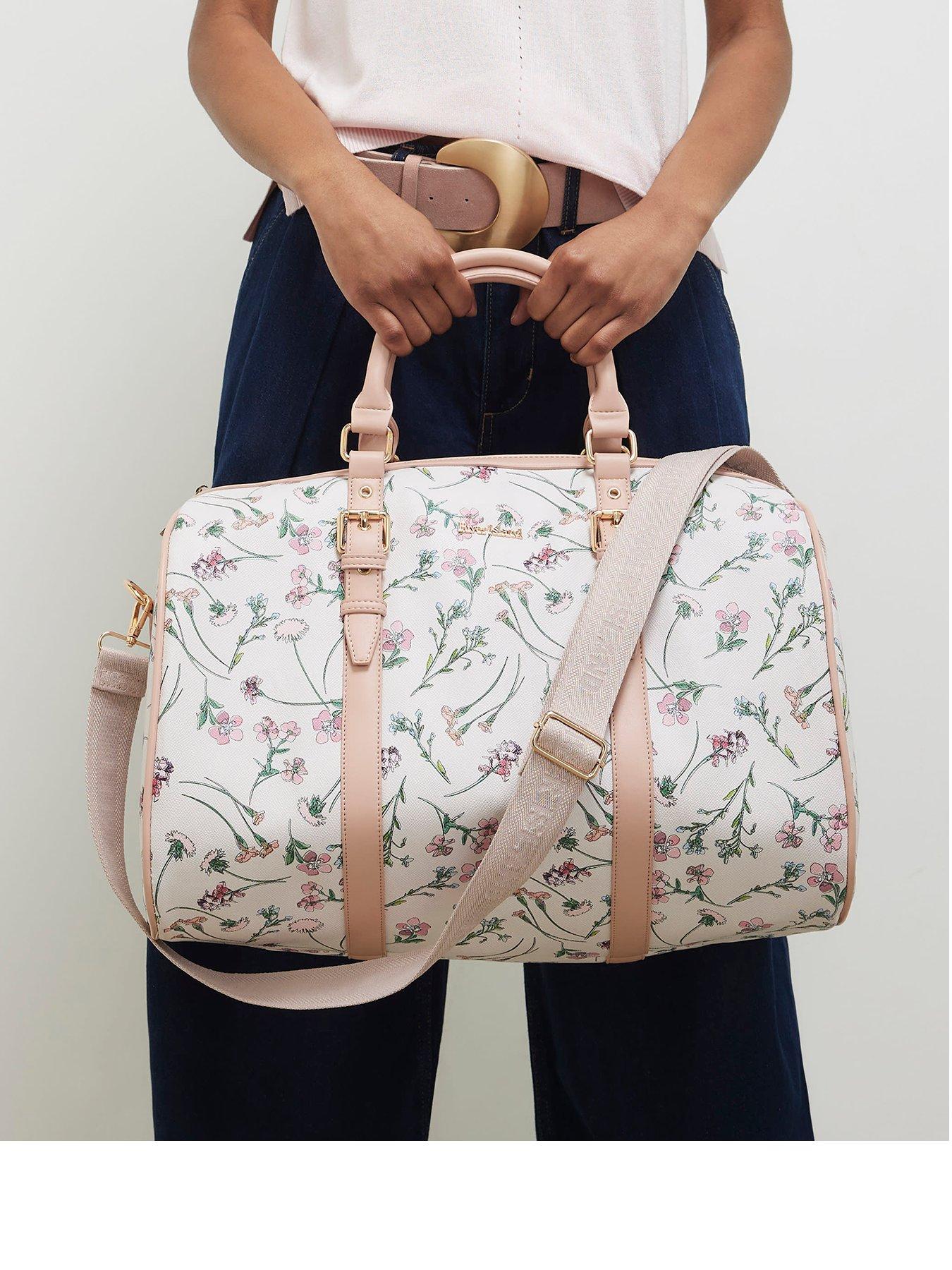 Image 1 of 1 of River Island Ditsy Floral Barrel Bag - Cream