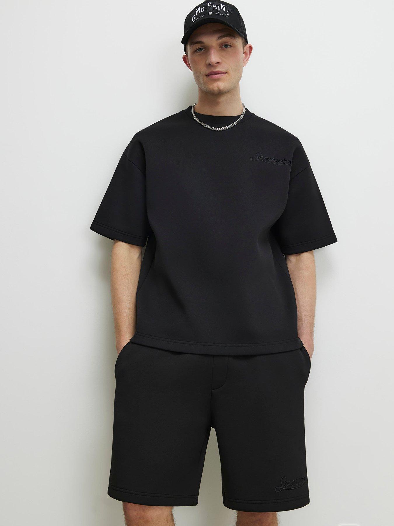 Image 4 of 4 of River Island Premium Regular Fit Sanctuaire Shorts - Black