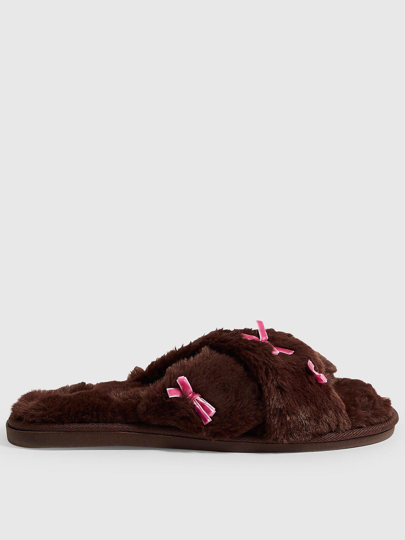 Image 1 of 4 of River Island Fluffy Cross Strap Bow Slippers