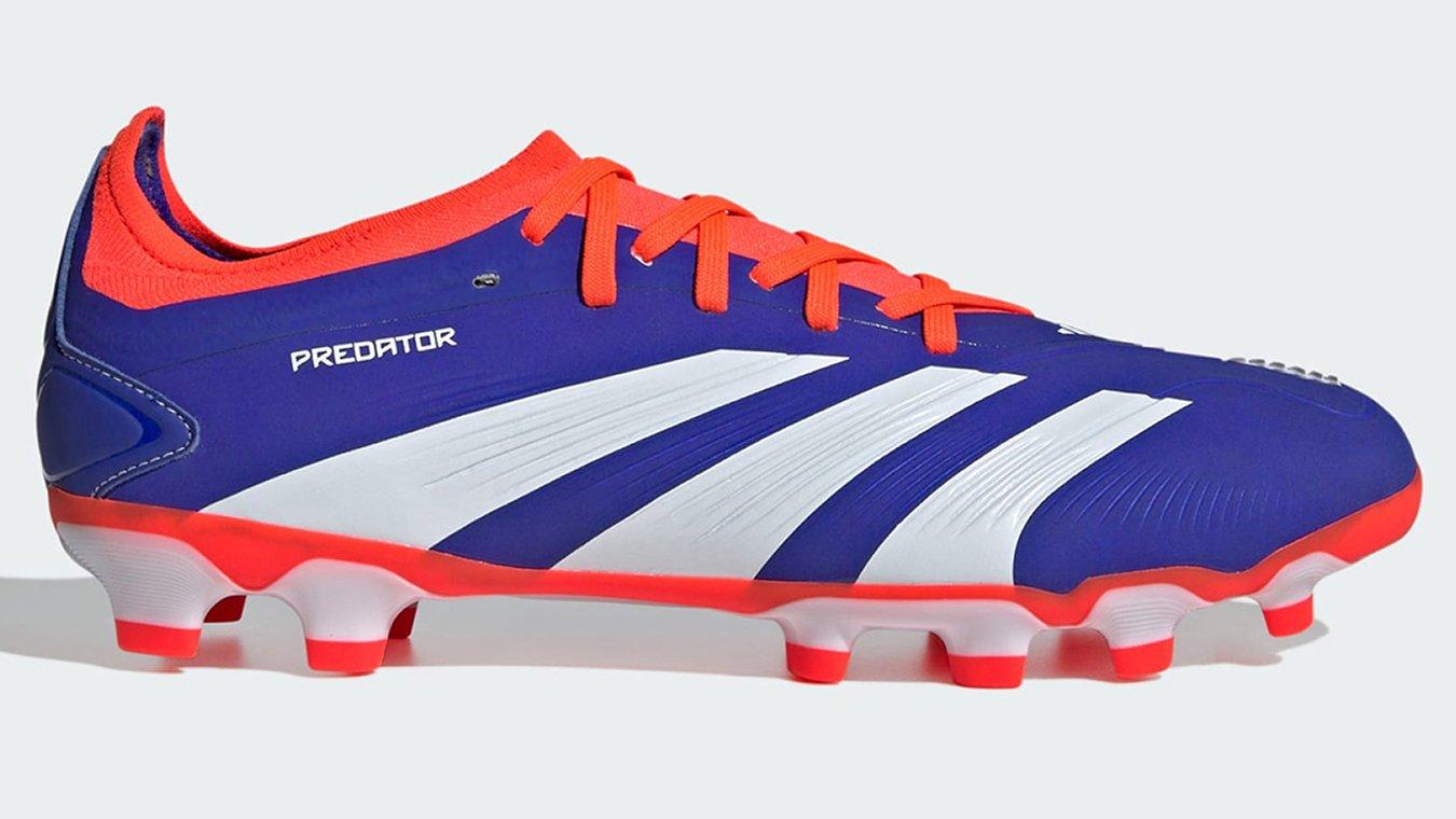 A pair of blue and red adidas Predator Football Boots. The perfect football boots for a defensive midfielder