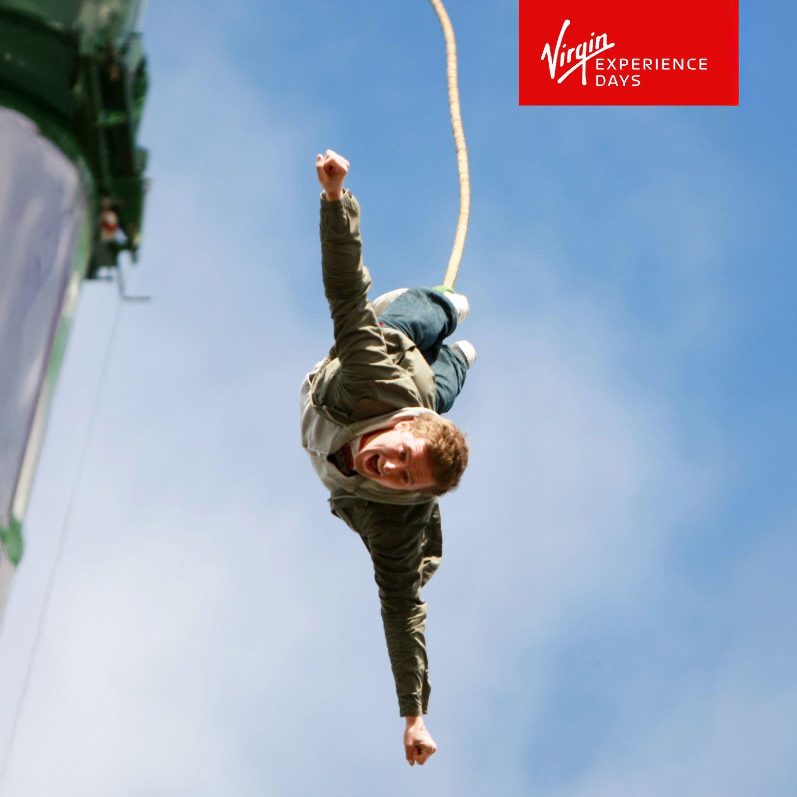 Picture of a man mid-air doing a bungee jump