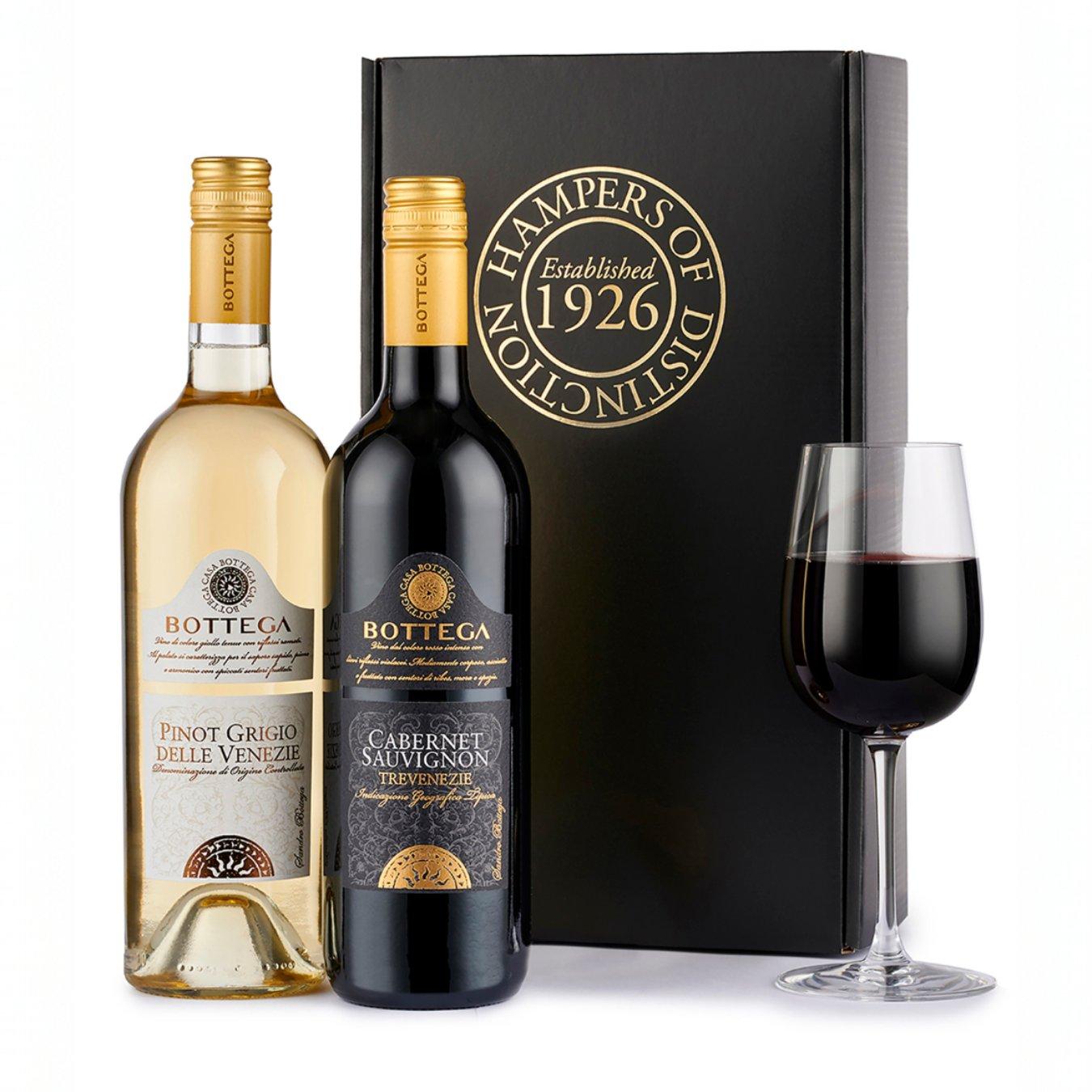 Image of the Spicers Of Hythe Italian Wine Duo - two bottles of wine (one red, one white) in front of a box. The perfect Christmas gift for your wine-loving friend.