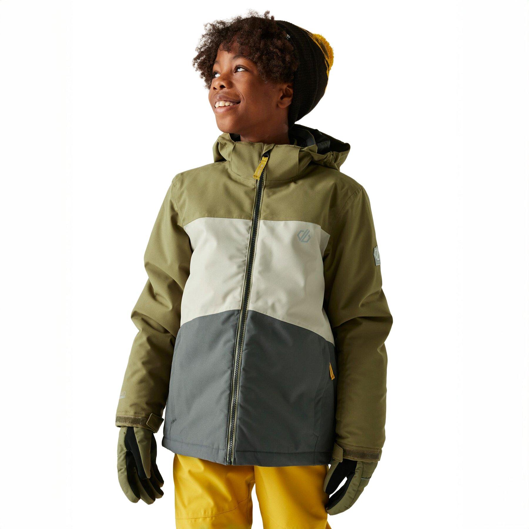 Little boy wearing a Dare 2b Boys Skiing Jacket that is khaki, white and dark grey.