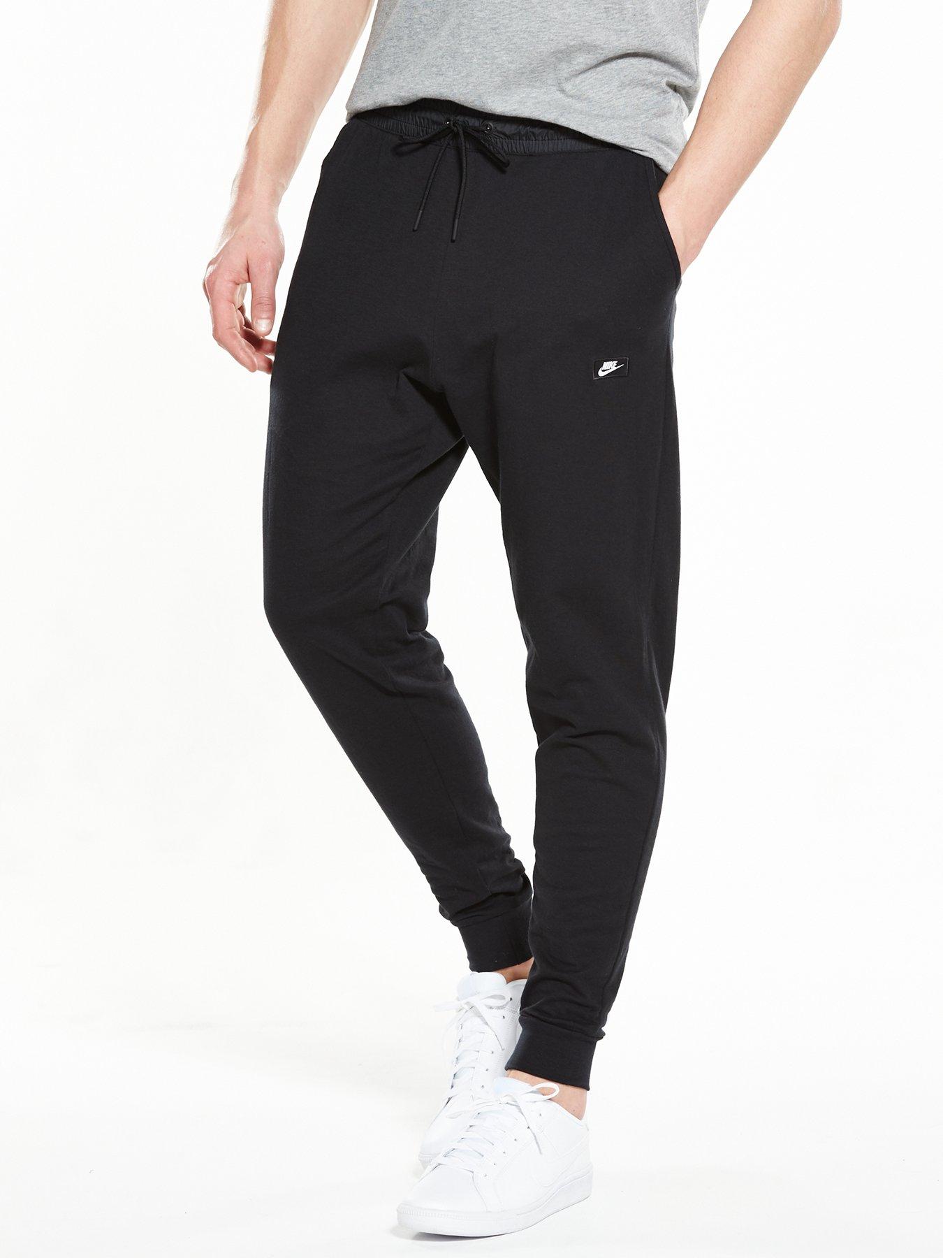 nike slim fit tracksuit