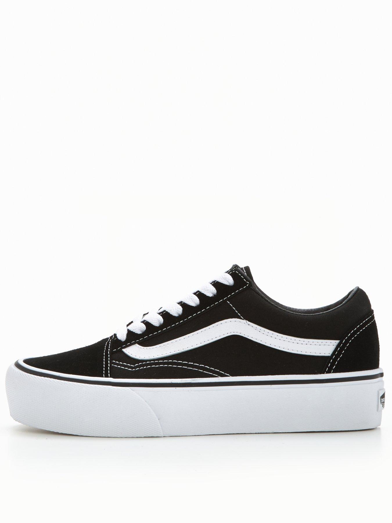 Black and shop white vans ladies