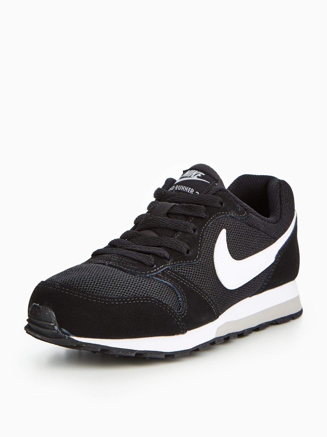 black and white nike junior trainers