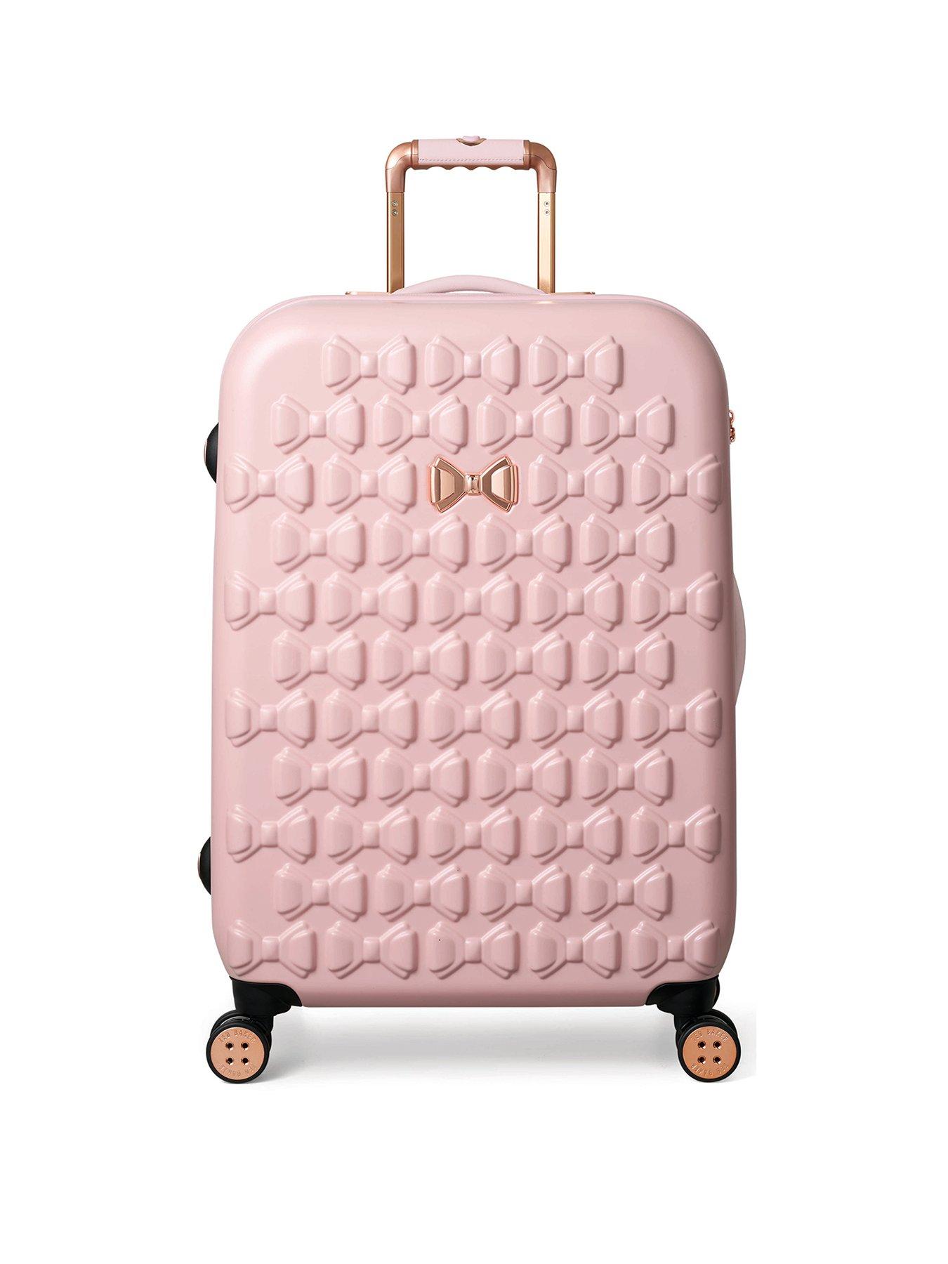 pink small suitcase