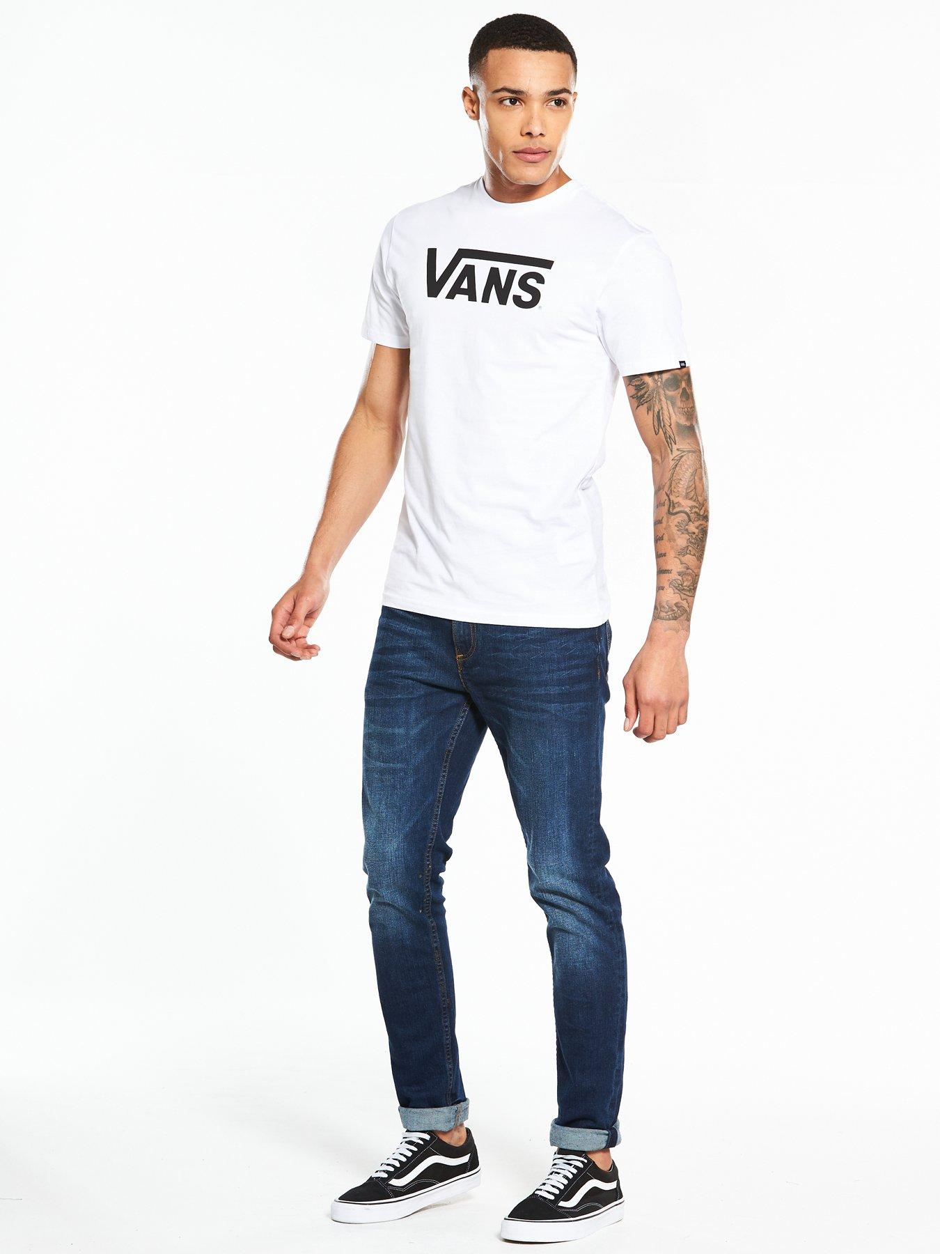 White vans with hot sale black vans logo