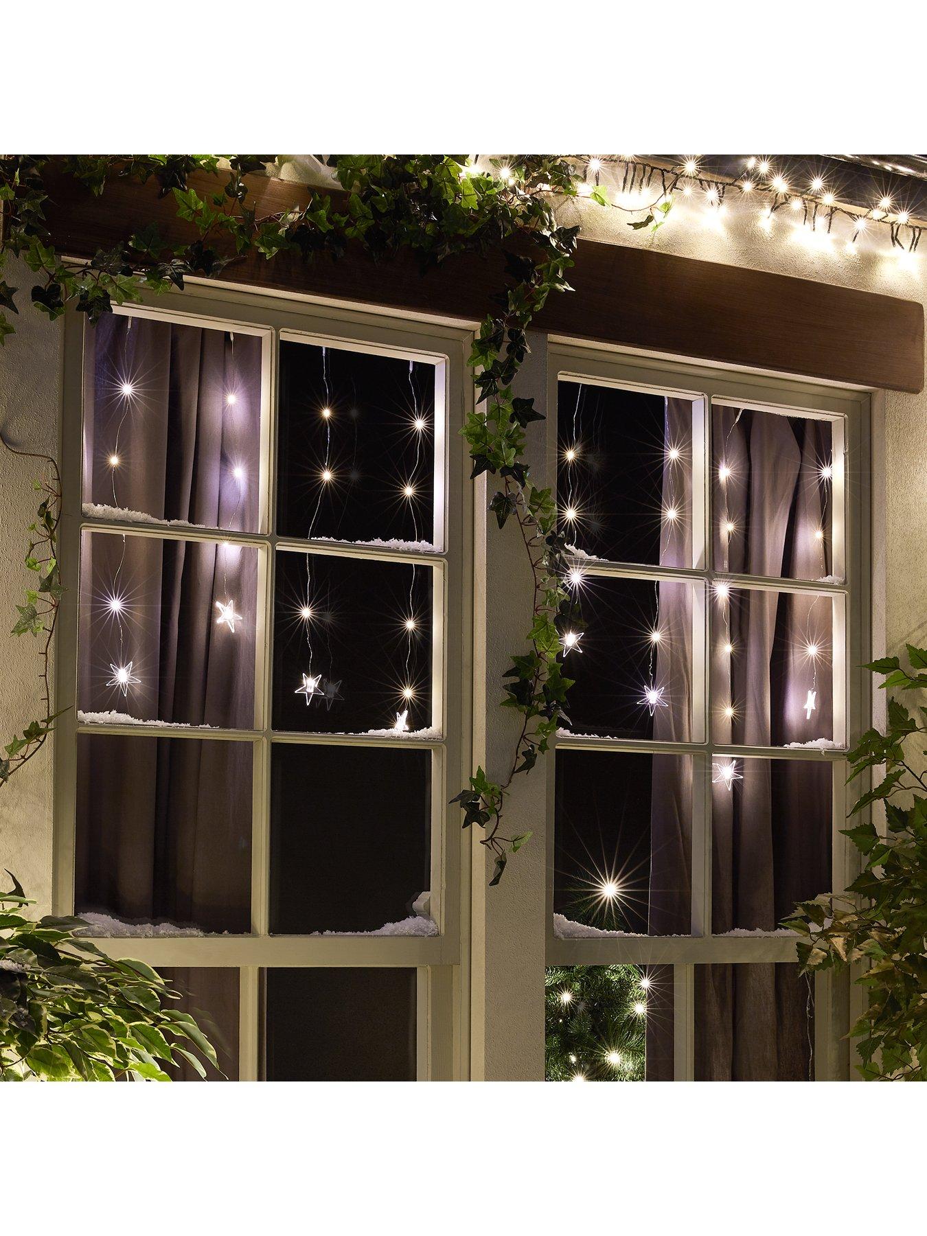 Product photograph of Very Home 80 Warm White Star Curtain Christmas Light from very.co.uk