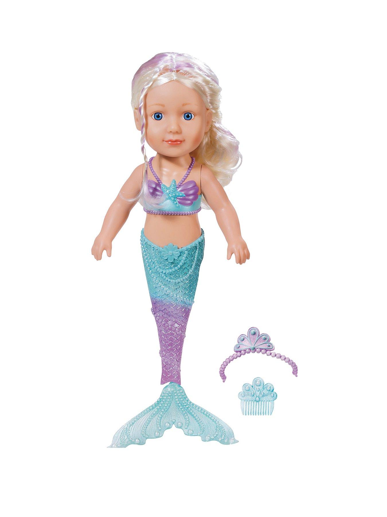 baby dolls swimming in the sink