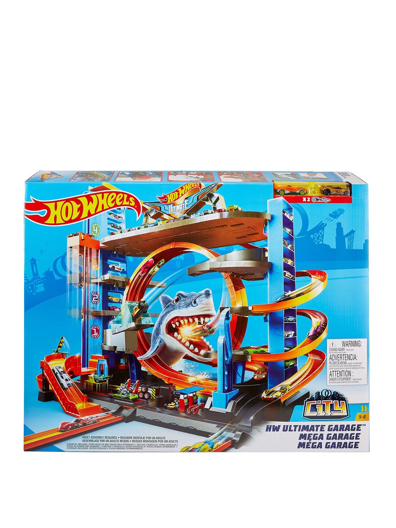hot wheels city ultimate garage playset with automatic lift jump loop shark attack