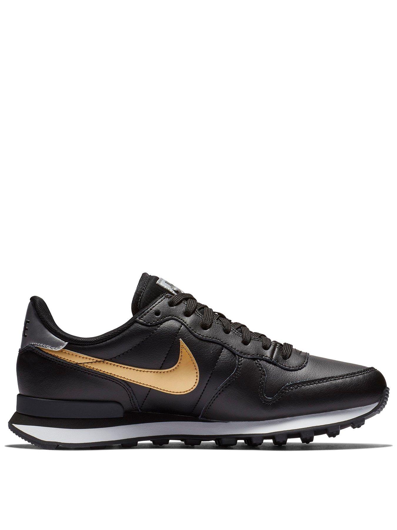 nike black and gold internationalist trainers