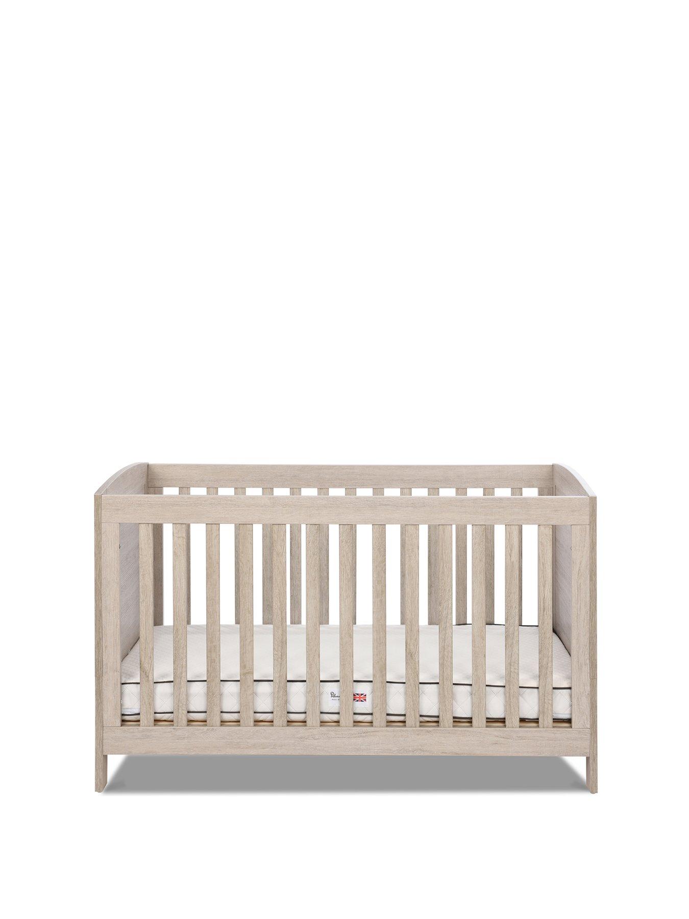 light grey cot bed