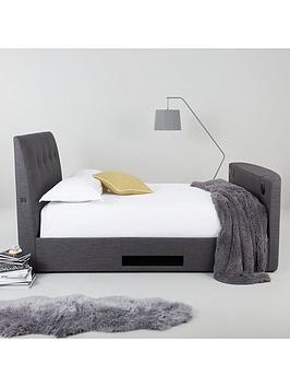 Product photograph of Very Home Avelon Fabric Side Lift Ottoman Storage Tv Bed With Bluetooth Usb Chargers Mattress Options Buy And Save - Bed Frame Only from very.co.uk