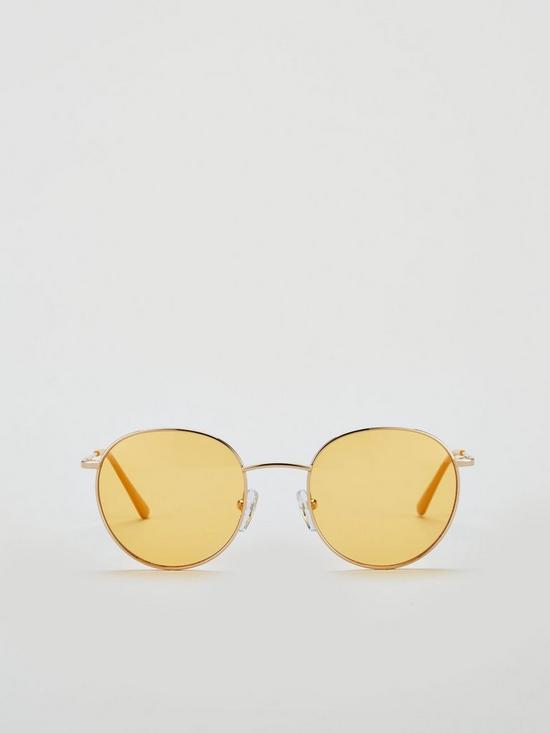 back image of calvin-klein-round-maize-sunglasses