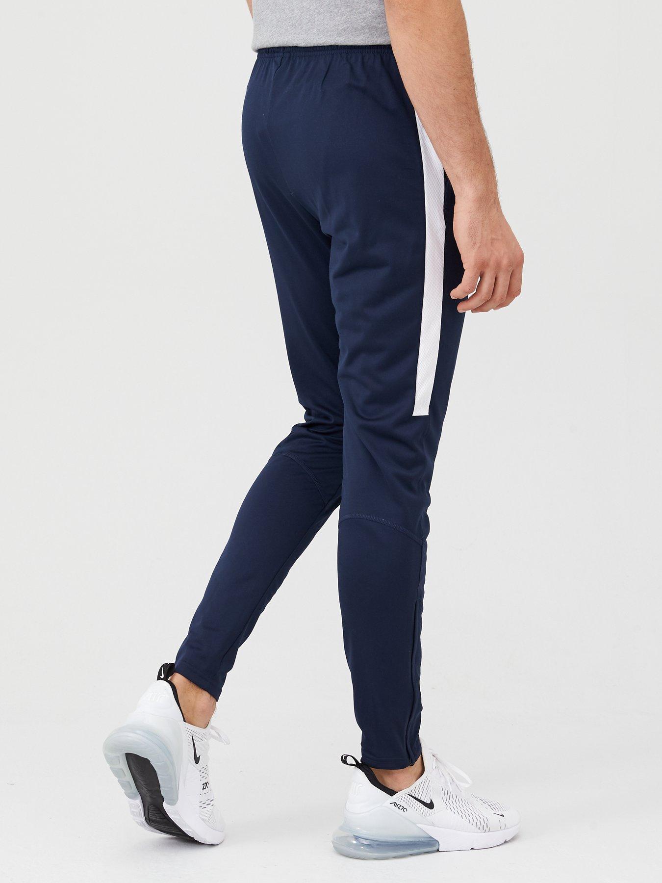 nike tech tracksuit black and white