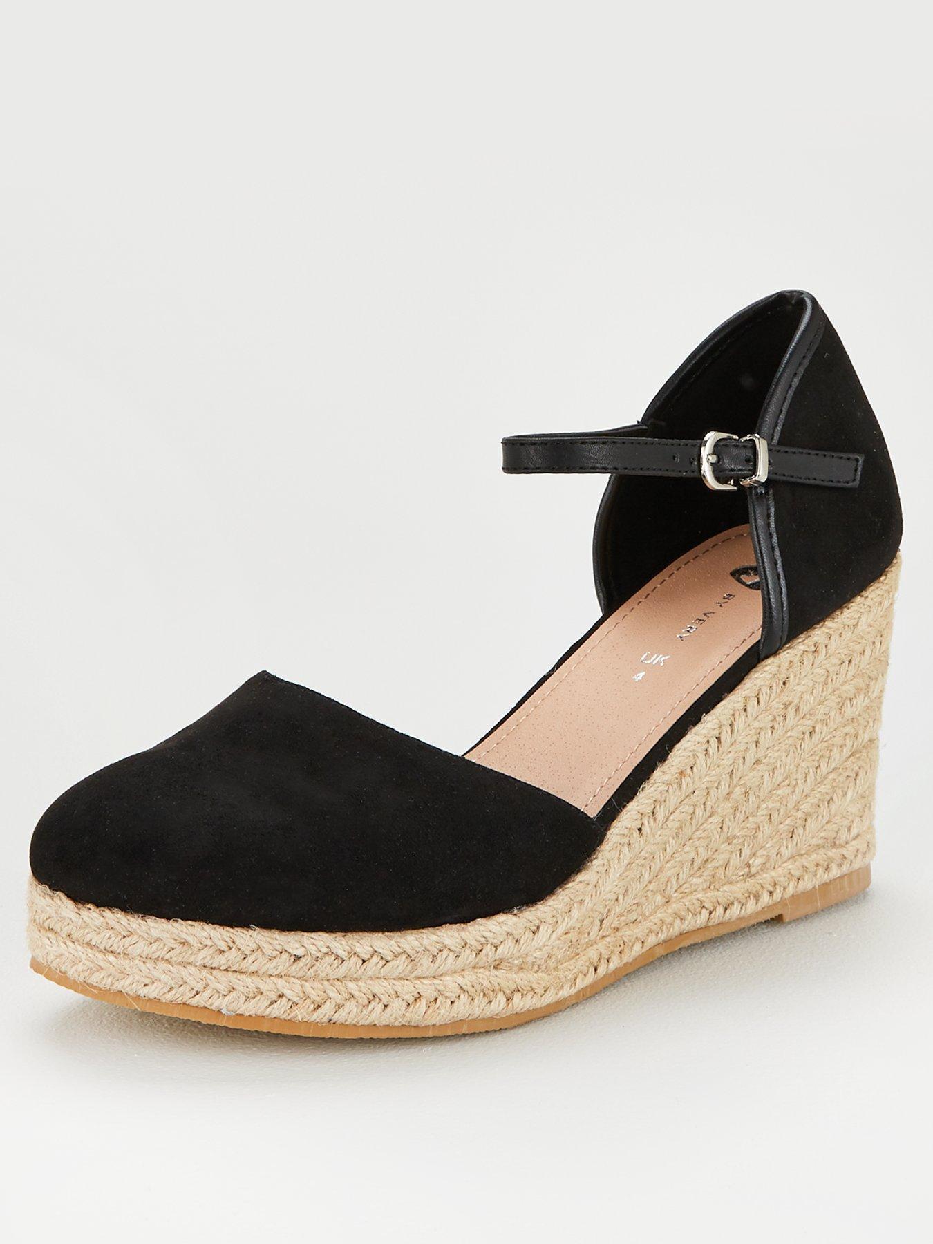 black covered toe wedges