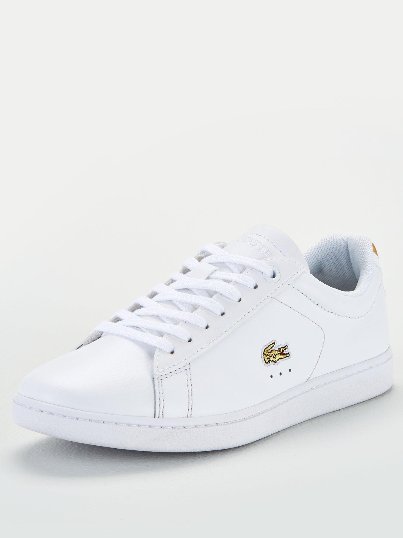 lacoste white and gold trainers