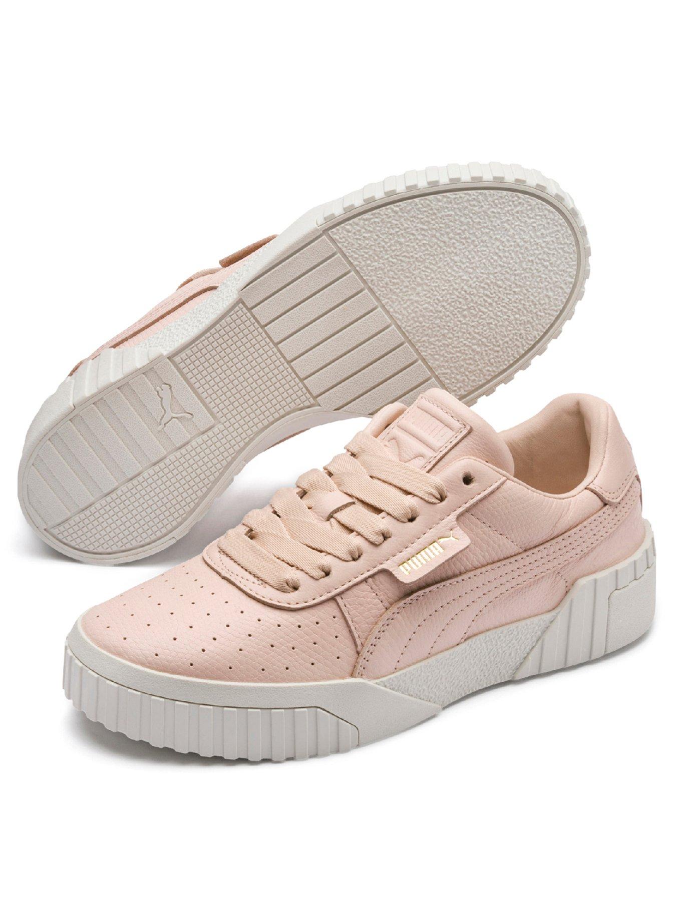 white and pink puma trainers