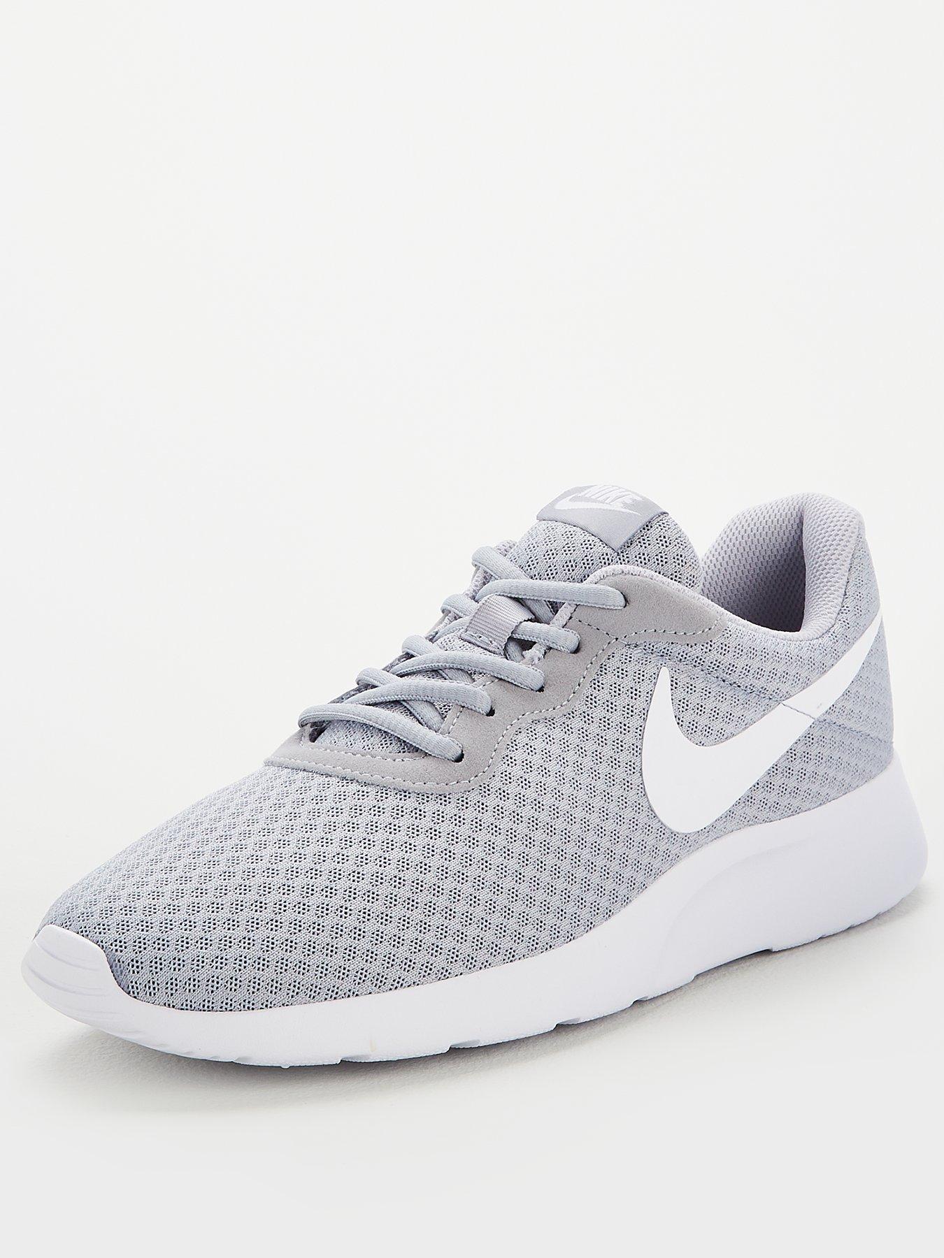 grey white nike trainers