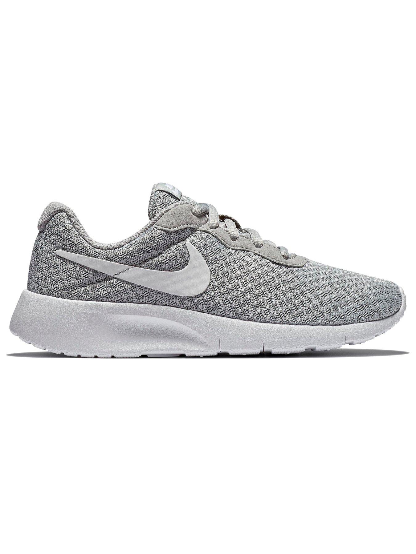 grey and white nike trainers