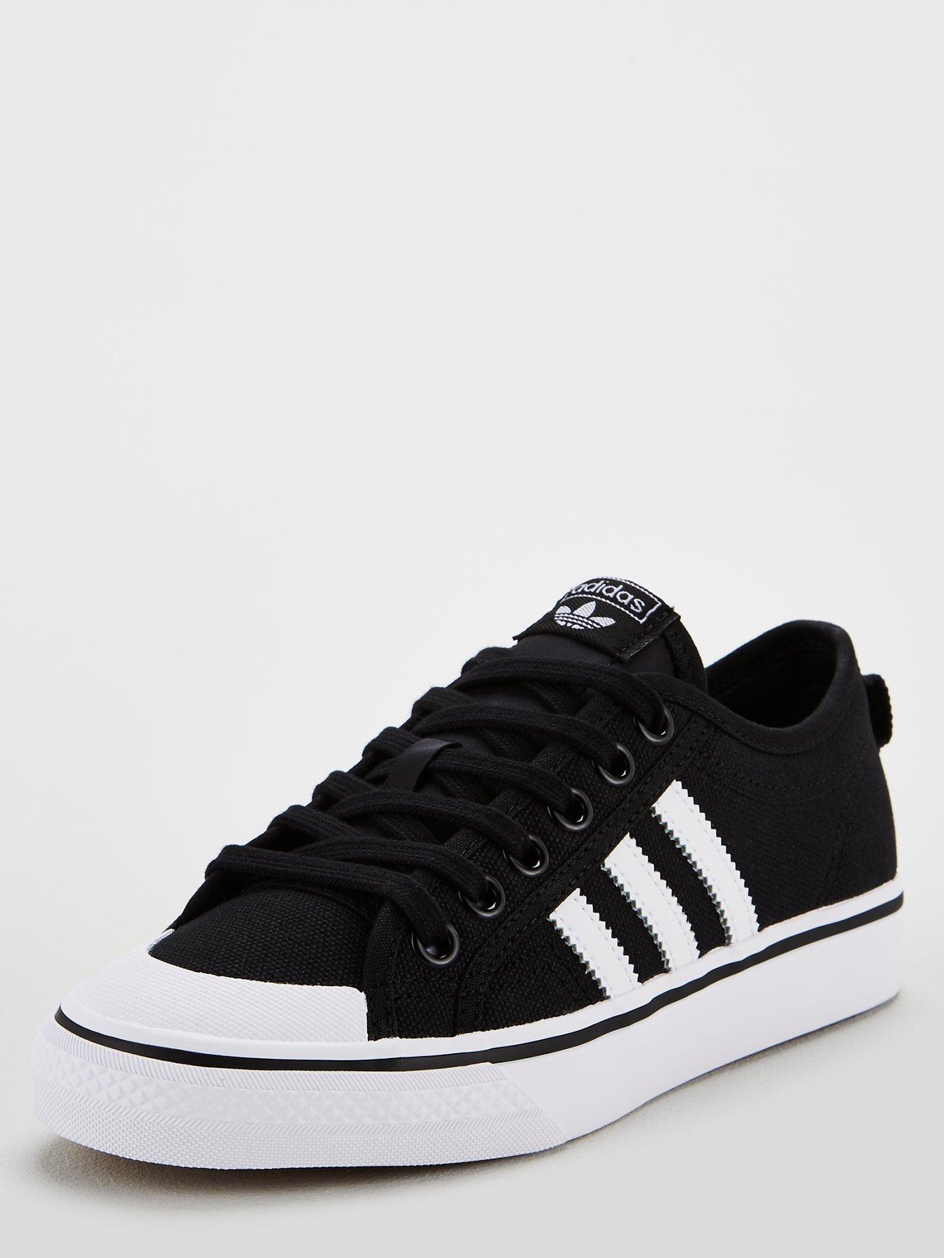 Adidas originals white hotsell and black nizza trainers