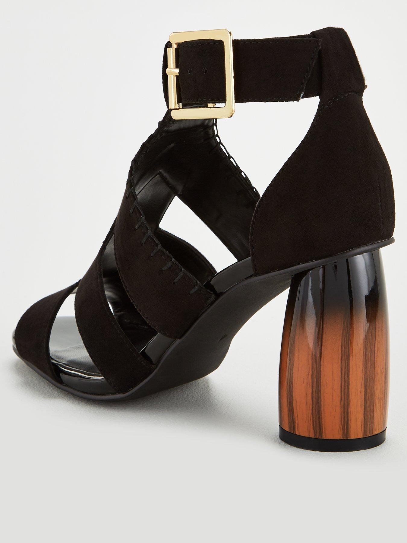 black caged heels uk