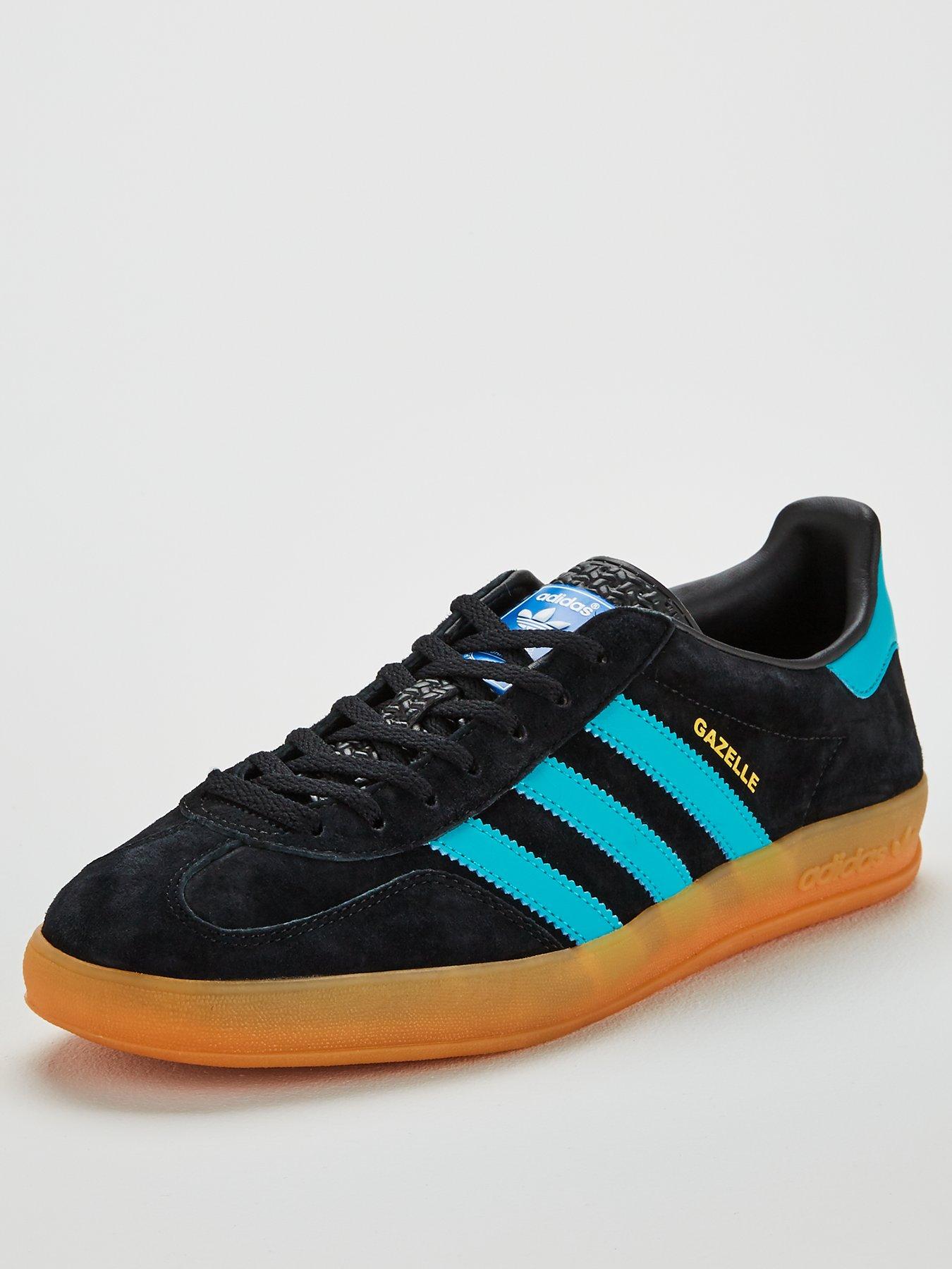 blue and black adidas gazelle