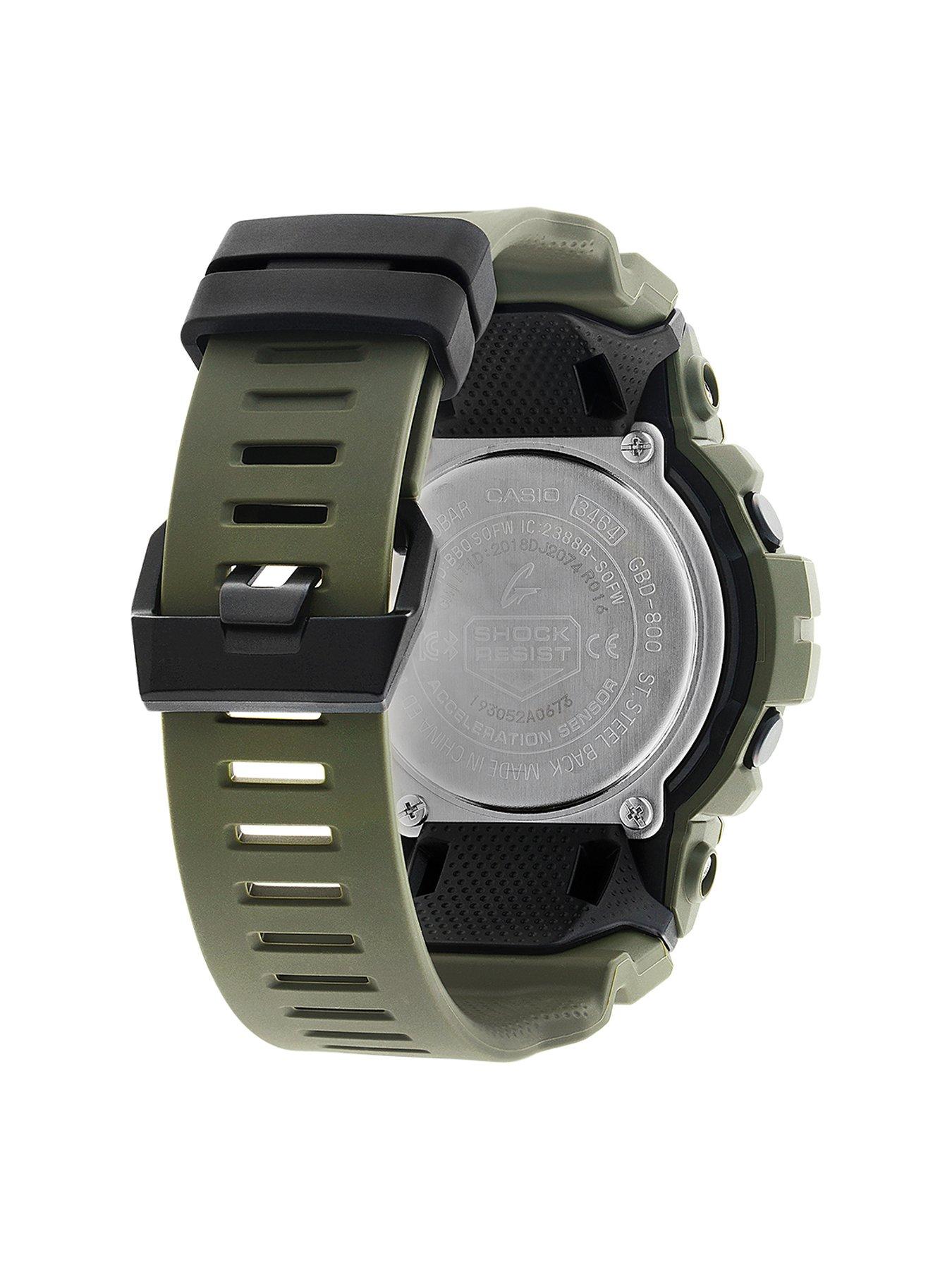 black and green g shock watch