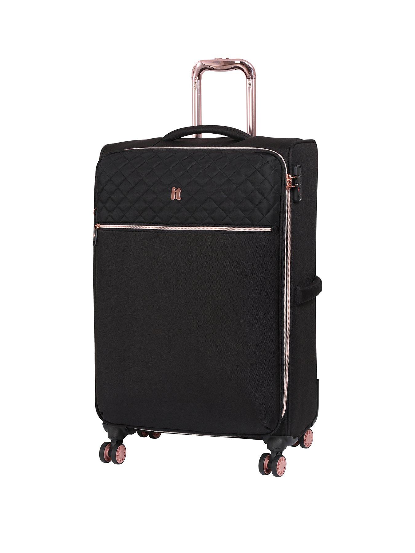 it black and rose gold luggage