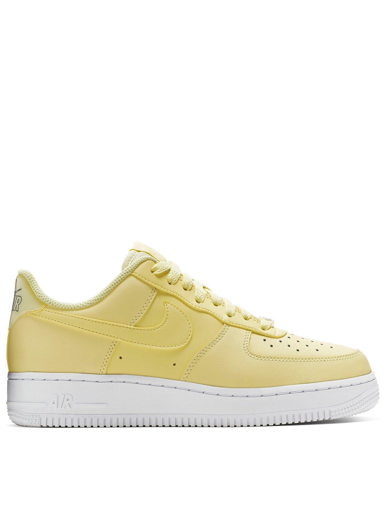 nike air force 1 trainers in white and yellow