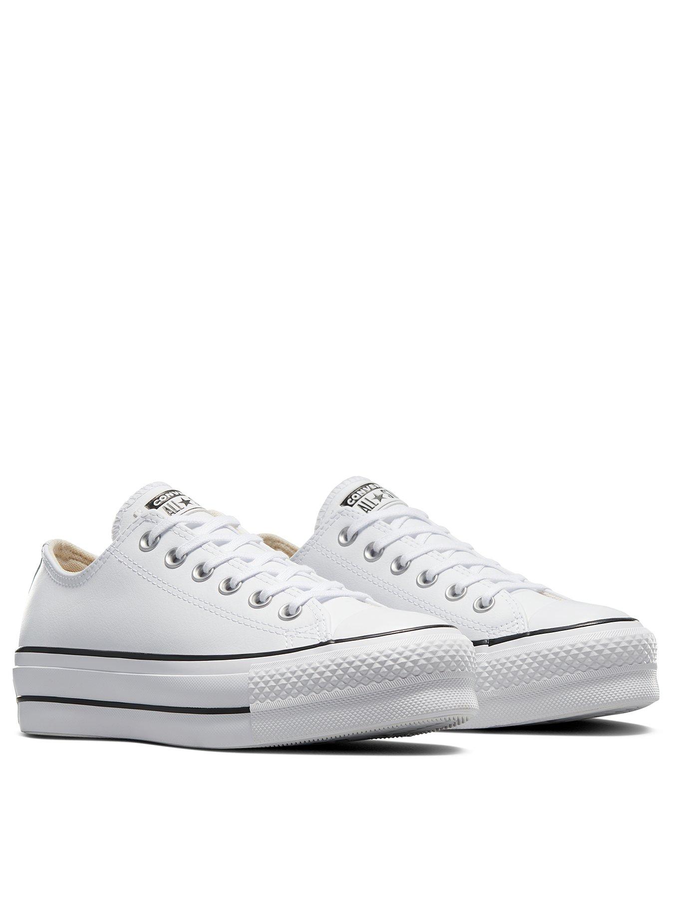 White leather converse hot sale with black stripe