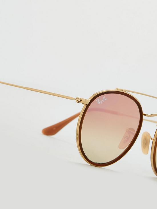 back image of ray-ban-round-sunglasses-gold