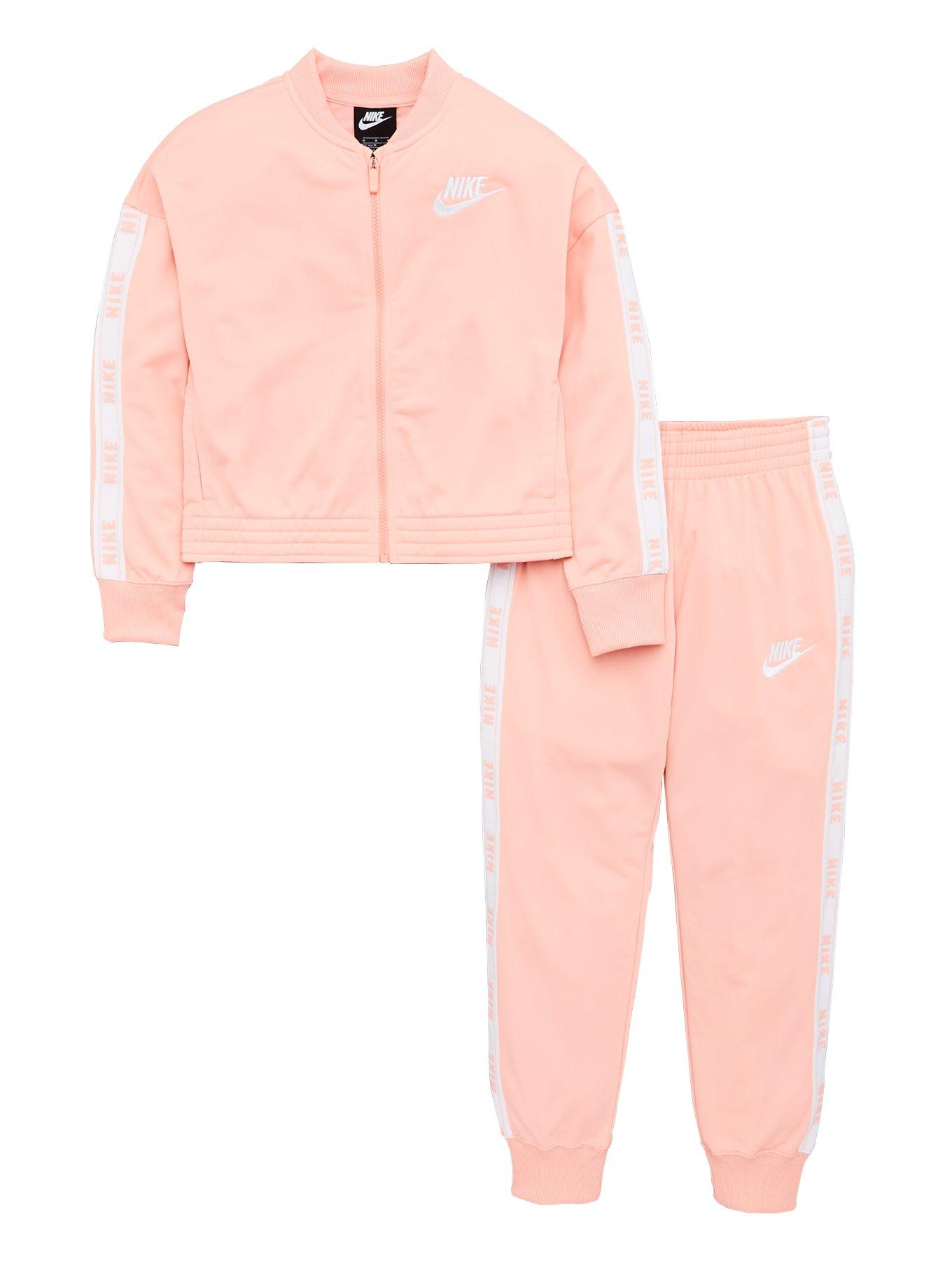 pink and white nike tracksuit