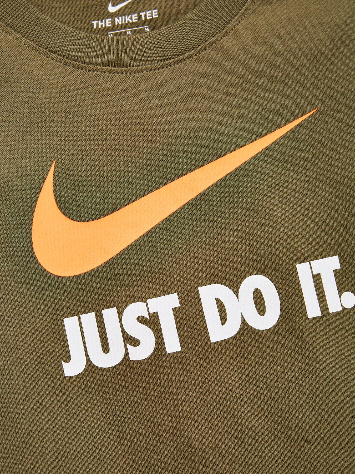 green and orange nike shirt