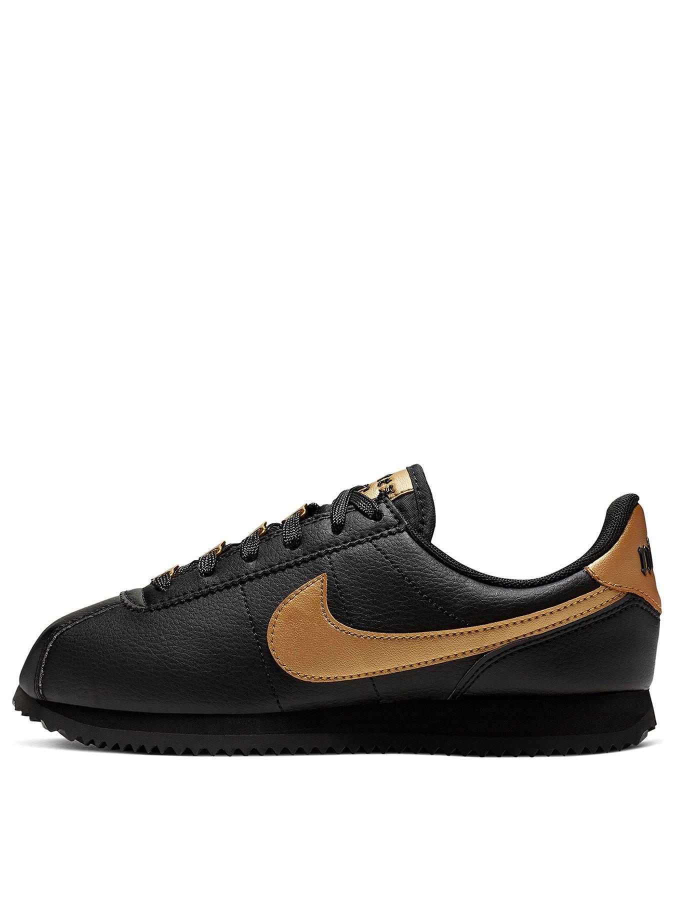 nike black & gold cortez suede trainers