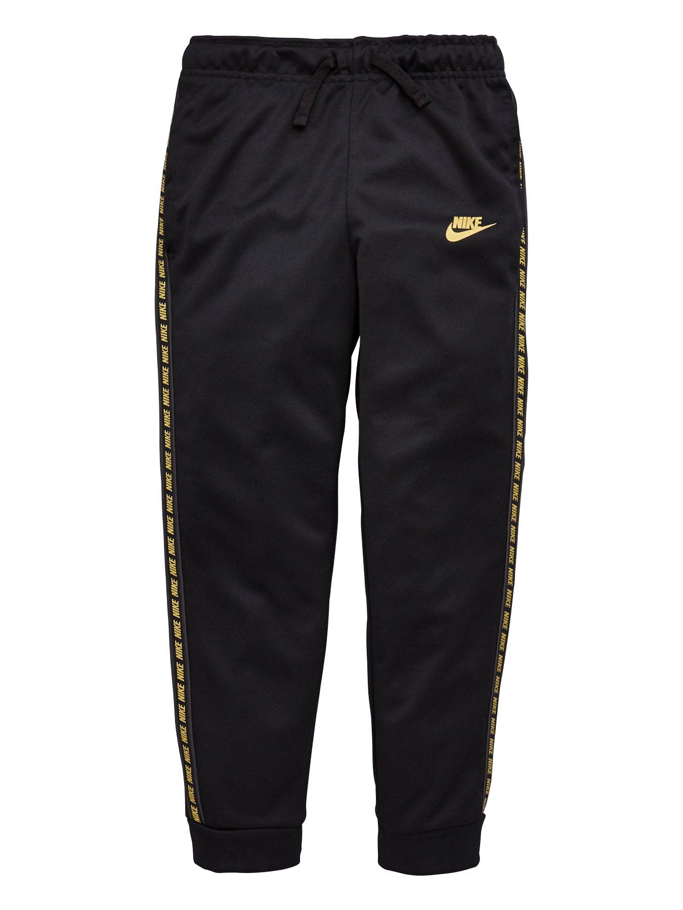 gold nike joggers