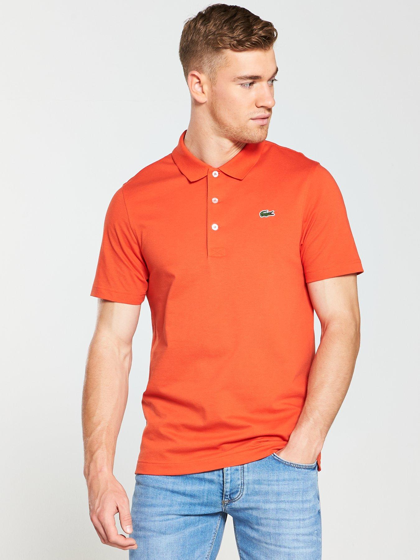 orange lacoste polo shirt