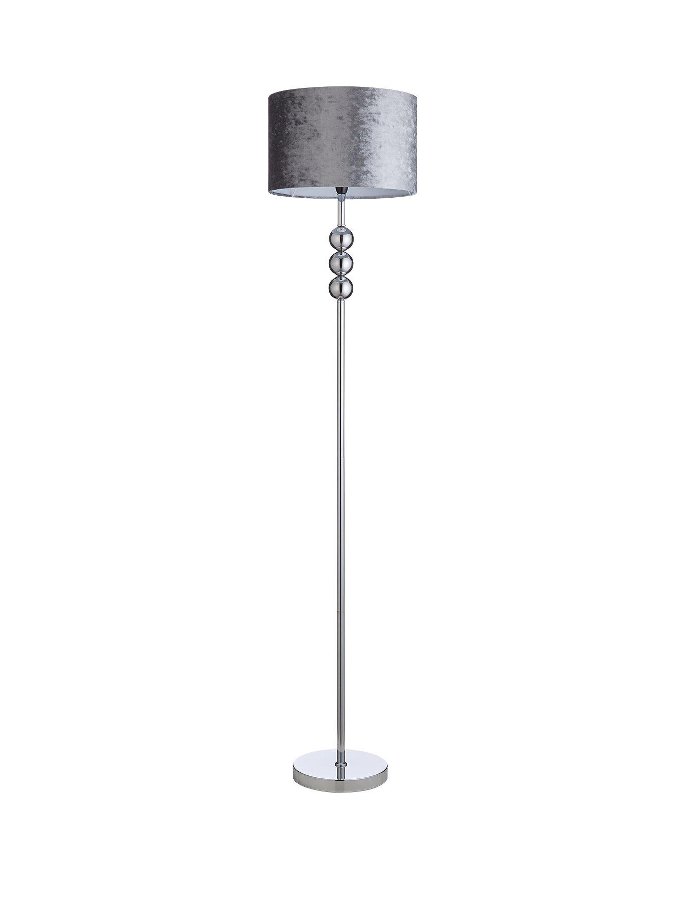 silver floor lamp with shelves