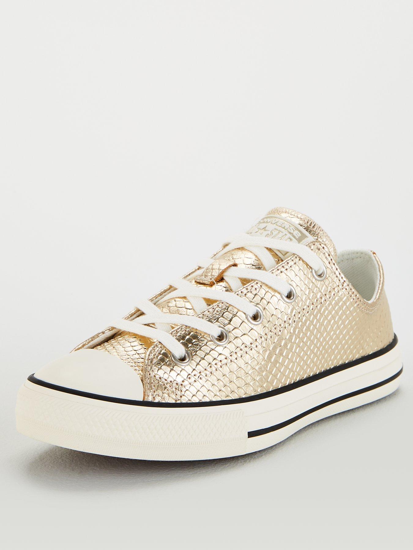 gold plimsolls