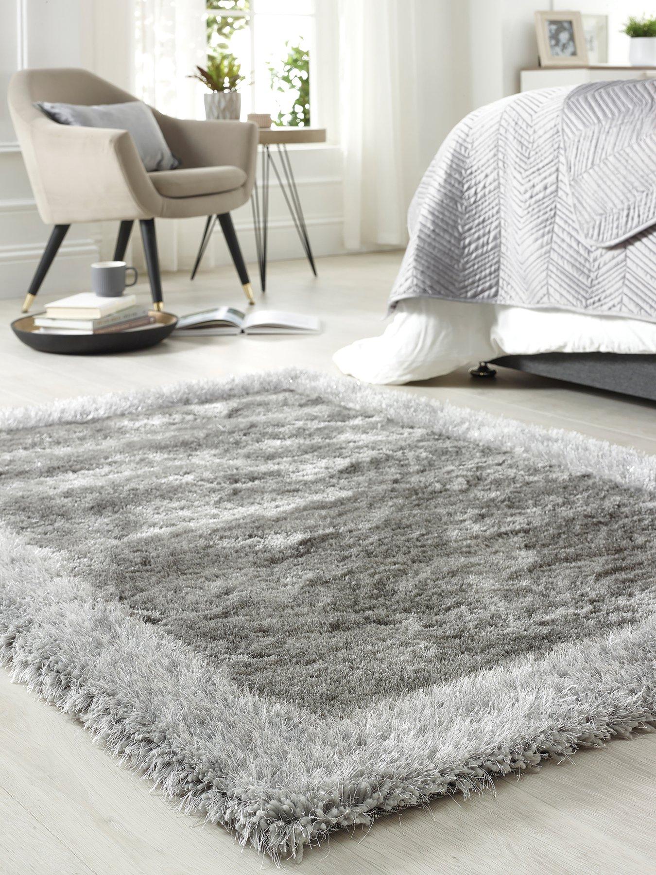 https://media.very.co.uk/i/very/P3EXH_SQ1_0000000035_SILVER_RSr/origins-shimmer-shaggy-border-rug.jpg?$180x240_retinamobilex2$