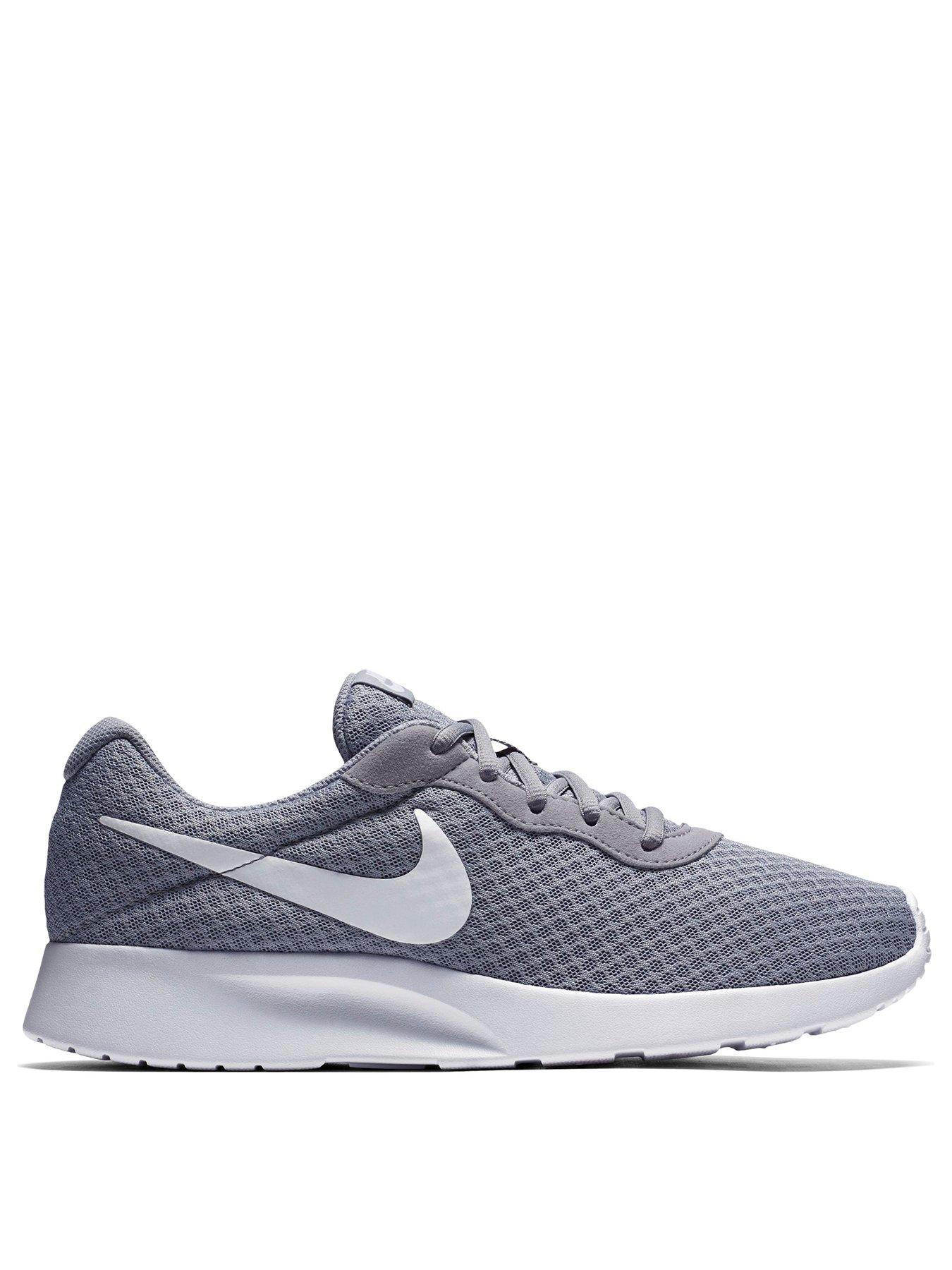 grey and white nike trainers