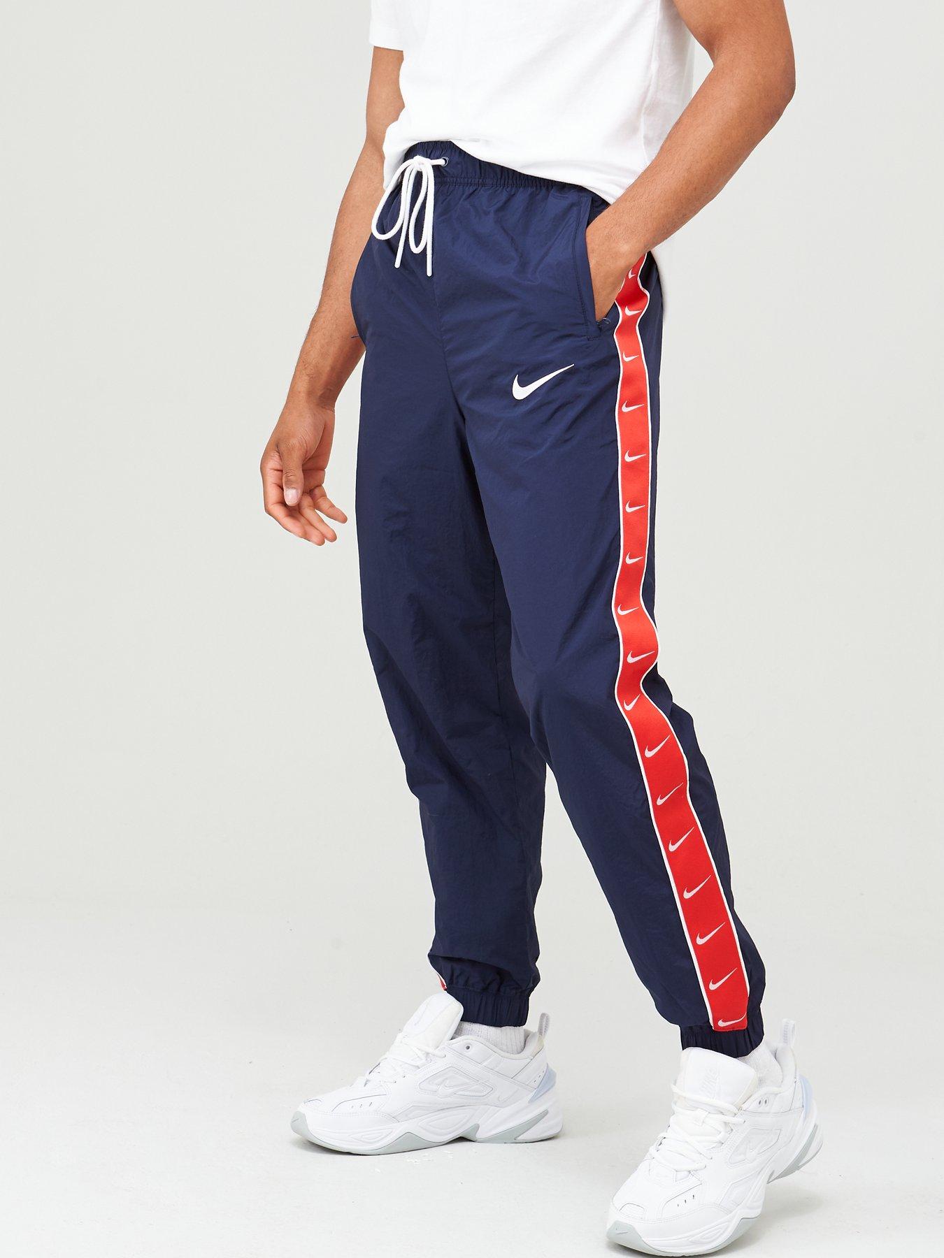 nike black swoosh woven joggers