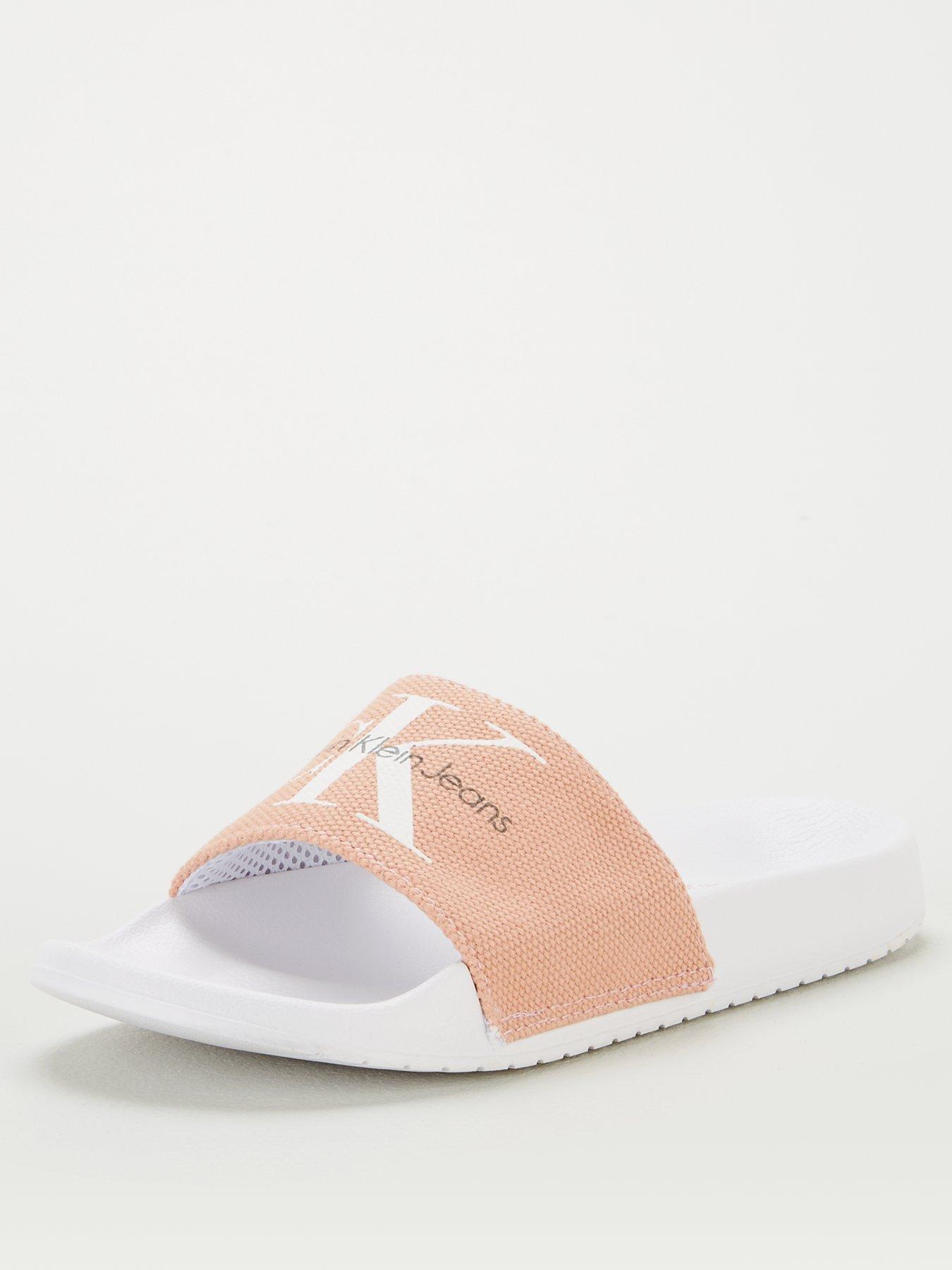 white calvin klein sliders
